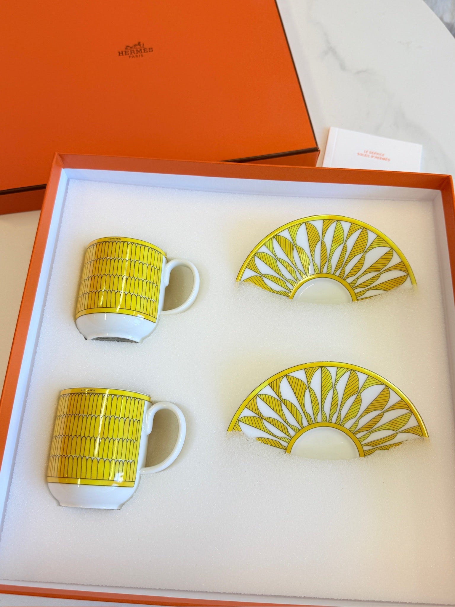 Hermès "Soleil d'Hermès" Coffee Cup & Saucer Set