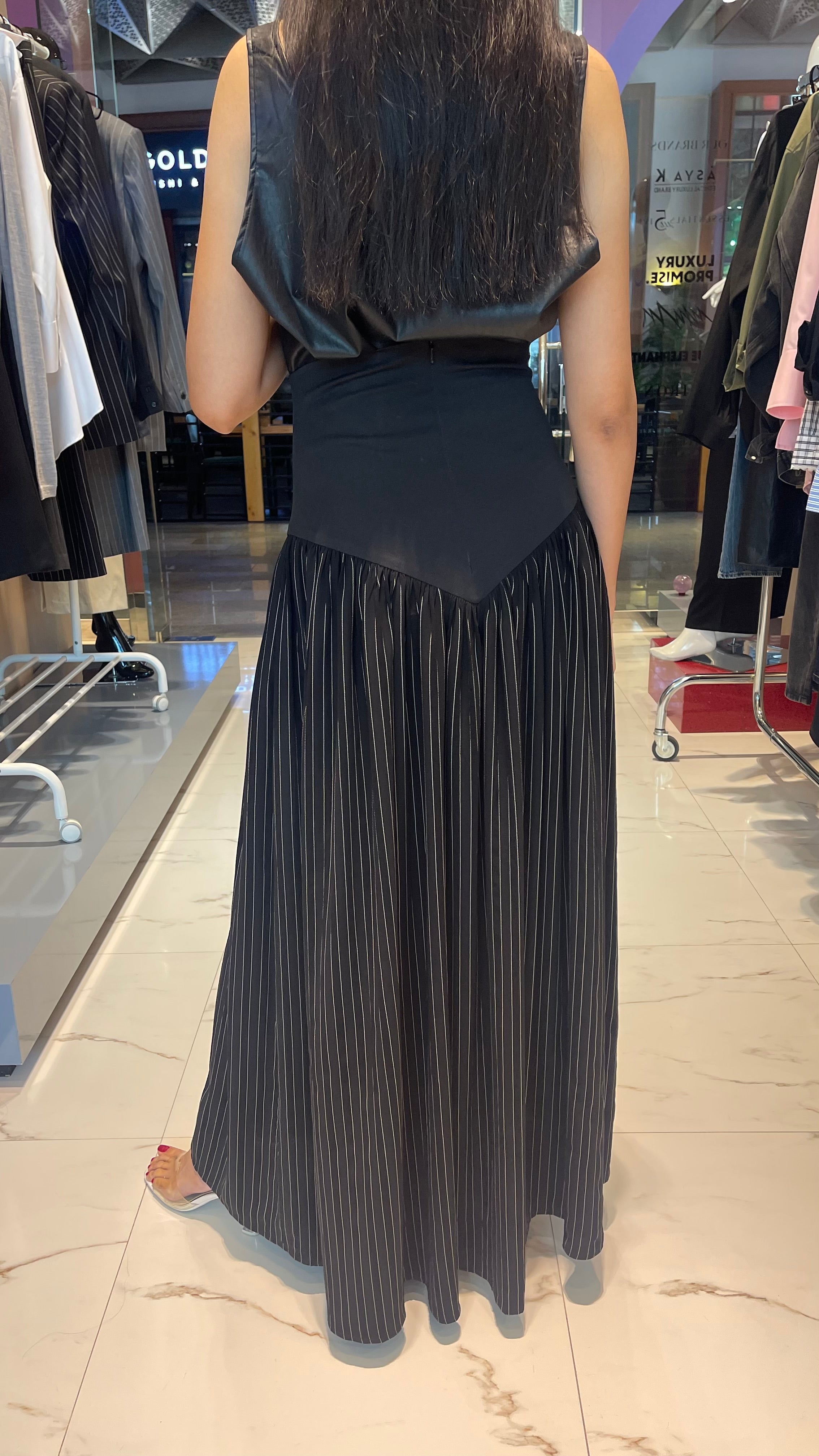 HIGH WAIST PINSTRIPE SKIRT (التنورة) “PIUPIU”