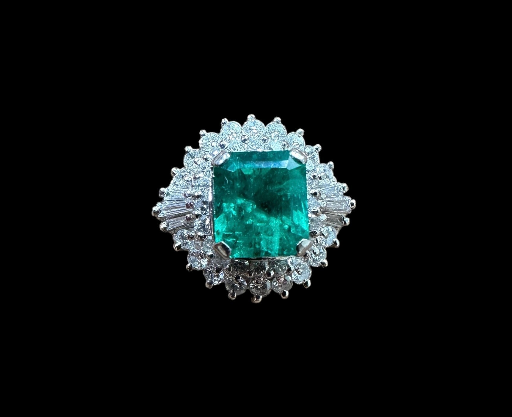 1.32ct Colombian Emerald Ring with surrounding 0.56ct Baguette & Brilliant Round Diamonds set in Platinum