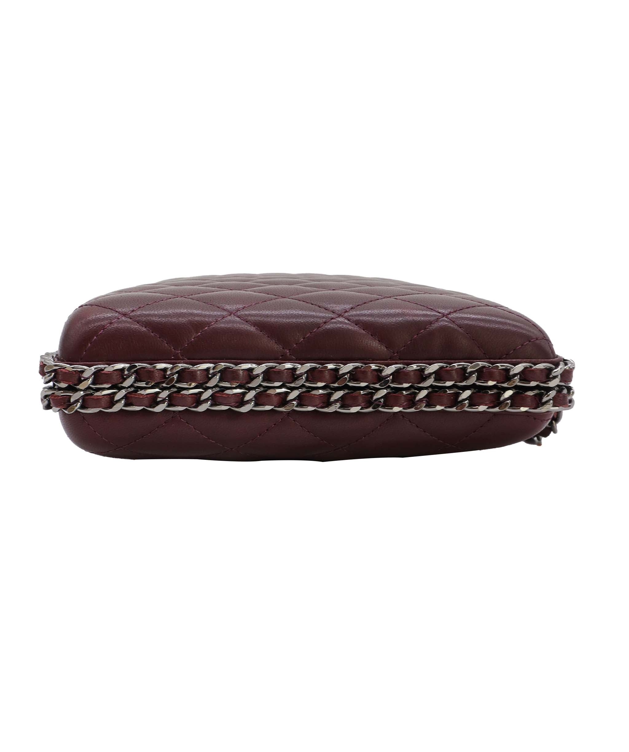 Chanel burgundy quilted clutch with crossbody strap