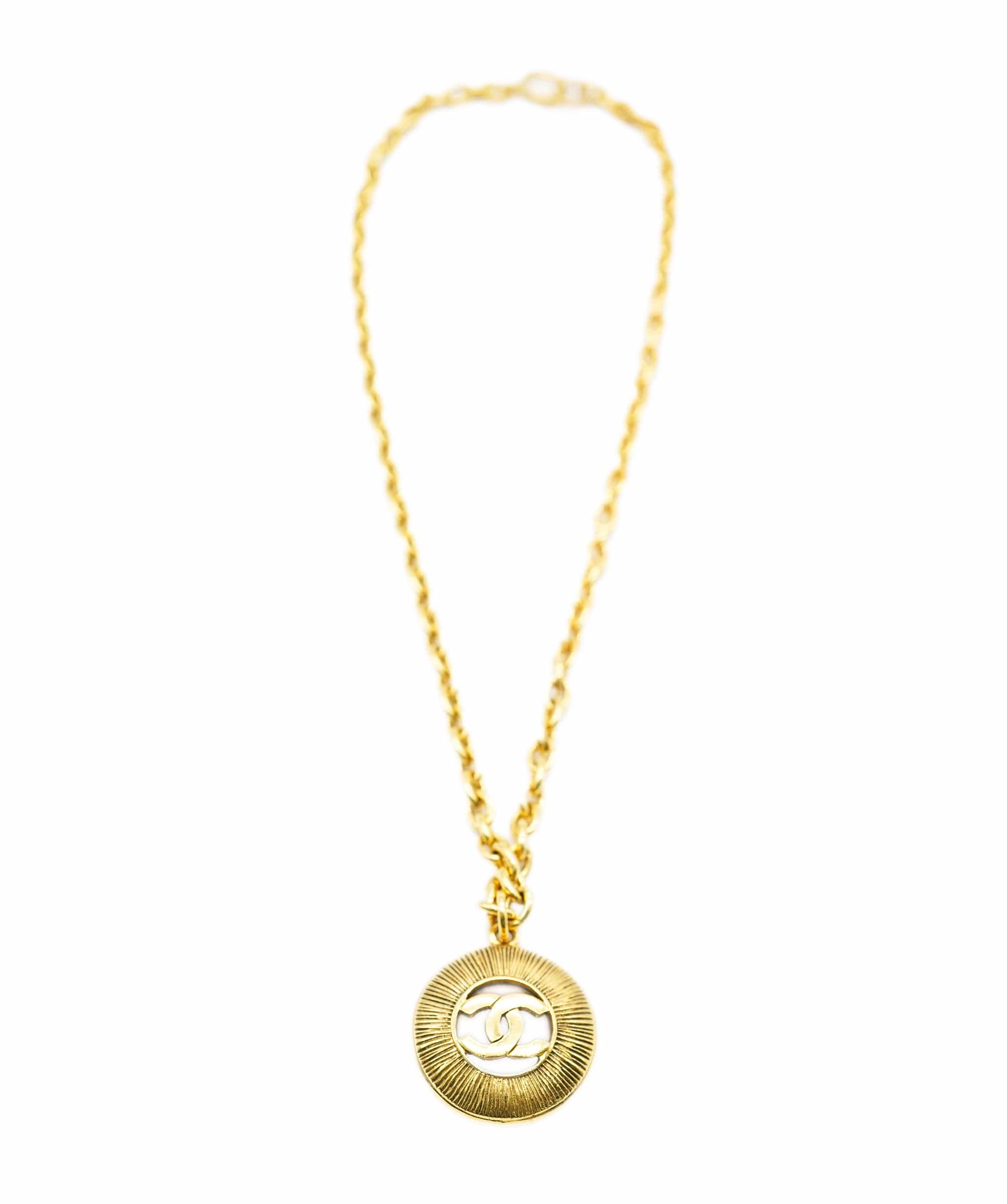 Chanel Chanel Sunburst 24k Gold Gilded Pendant Necklace AGL2512