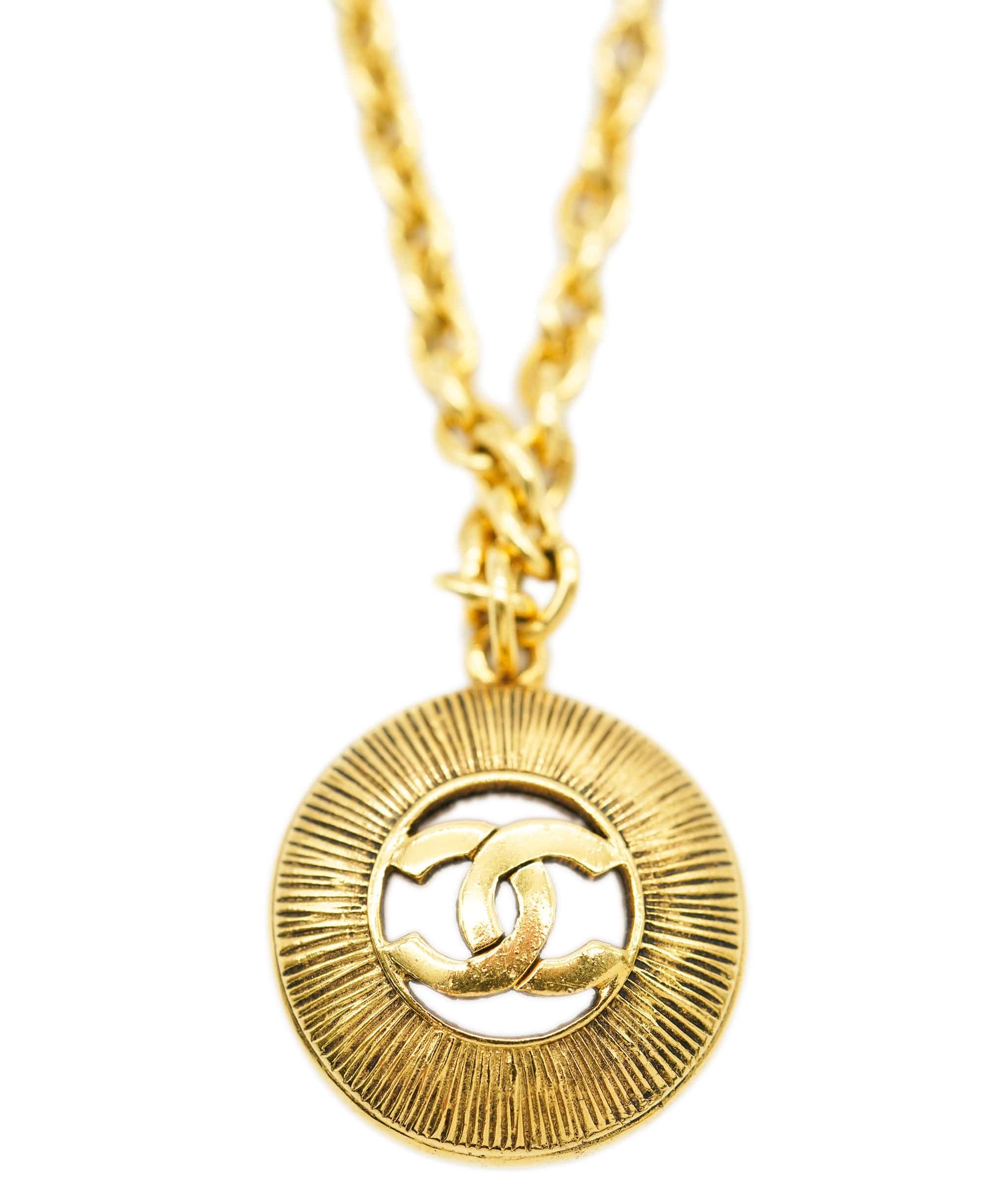 Chanel Chanel Sunburst 24k Gold Gilded Pendant Necklace AGL2512