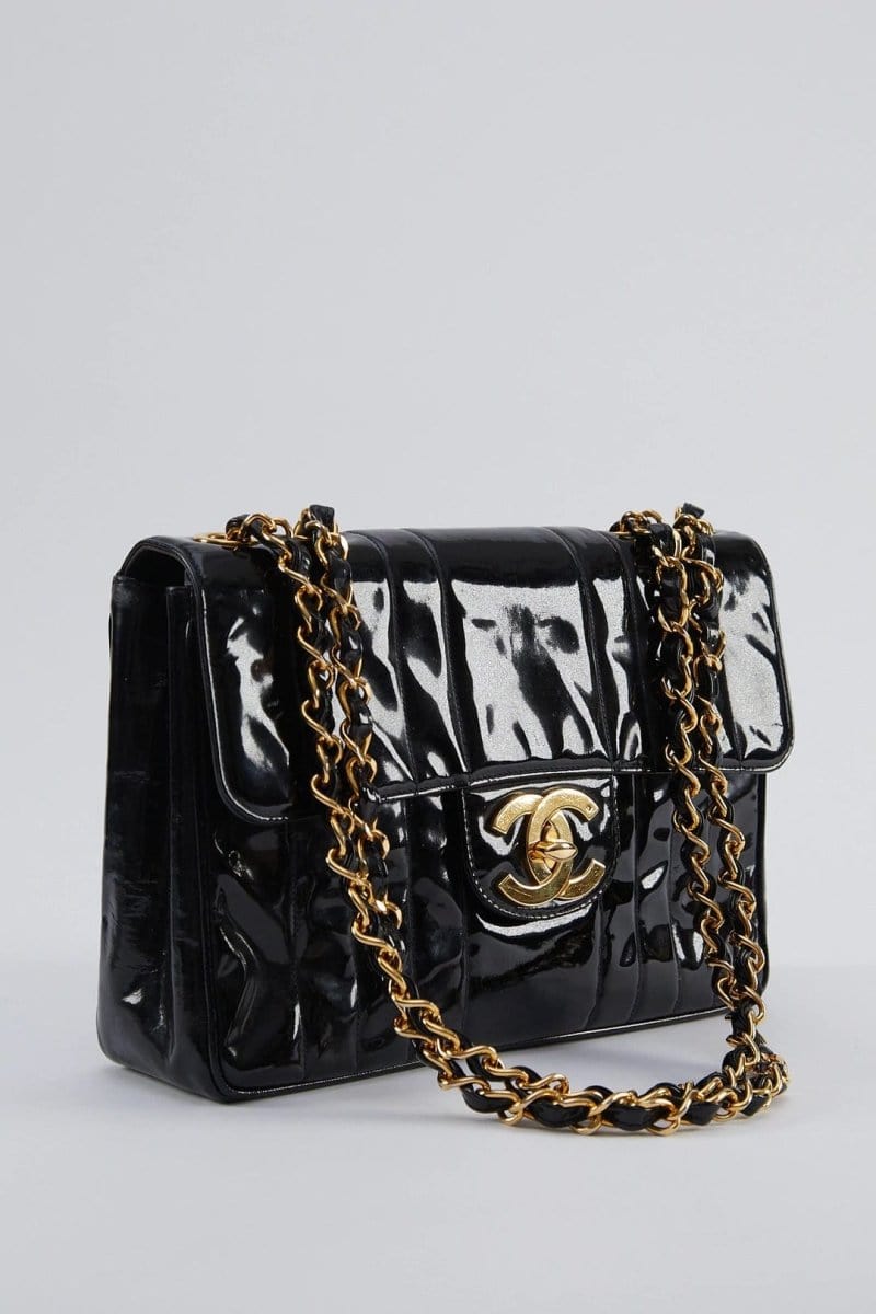 17. LP X C Chanel mademoiselle jumbo patent black flap