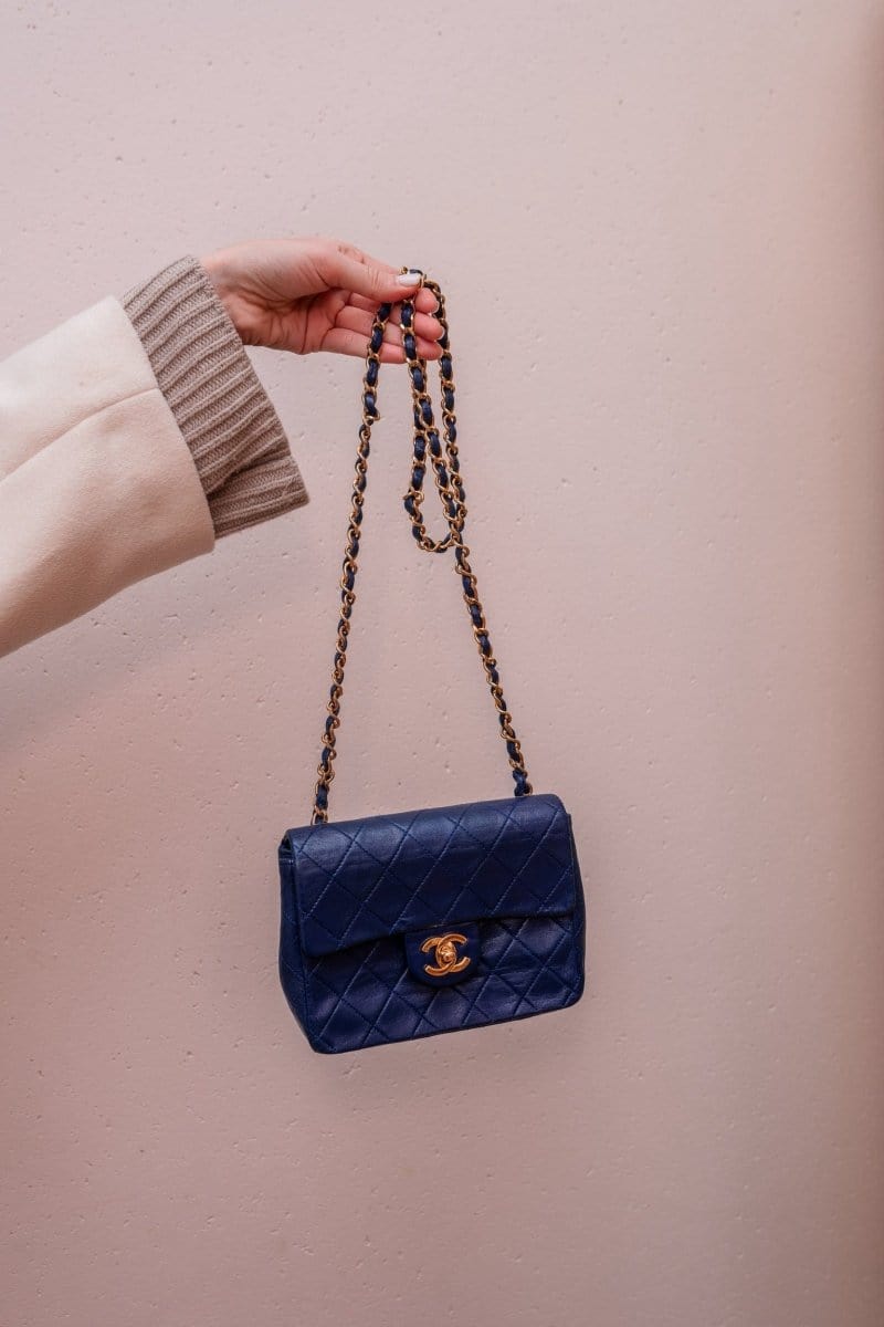 57. Lp x christos Chanel Vintage 7" Navy Mini Classic Flap Bag - AWL2109