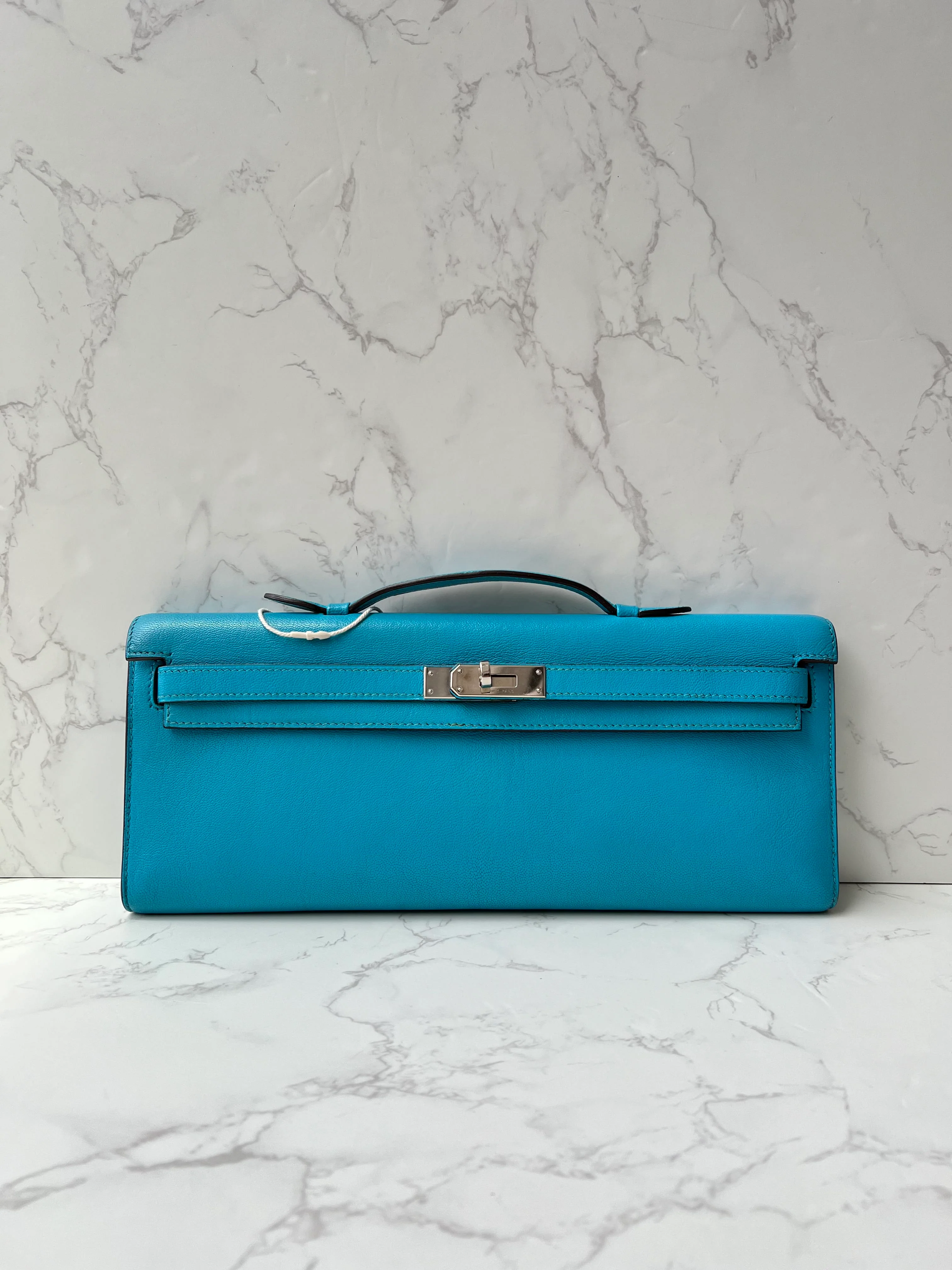 Hermès Hermes Kelly Cut Blue Aztec Chevre PHW #O
Comes With Dustbag and Receipt SYCF1103KC