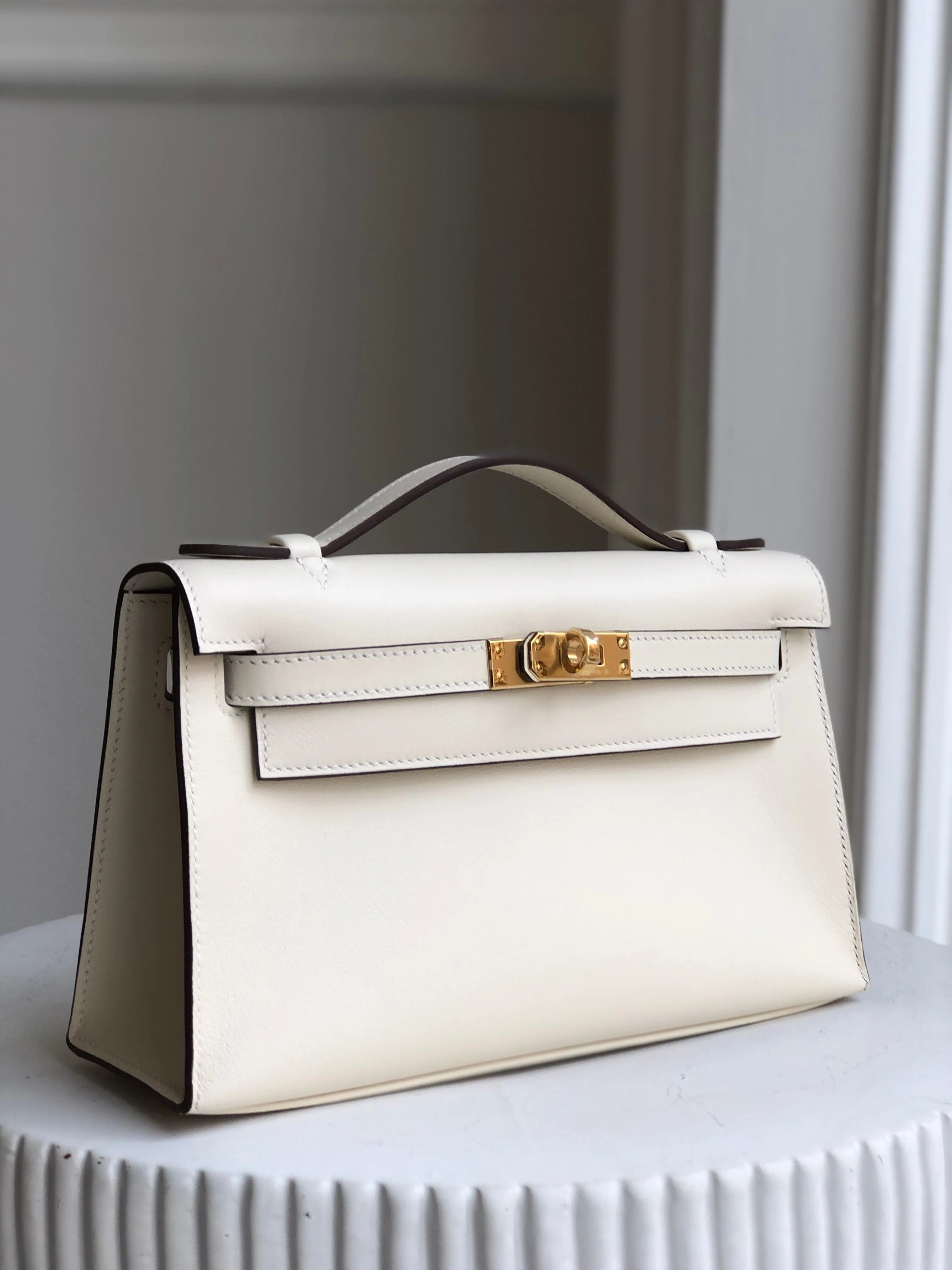 Hermes HERMÈS KELLY POCHETTE NATA Swift Leather with Gold Hardware