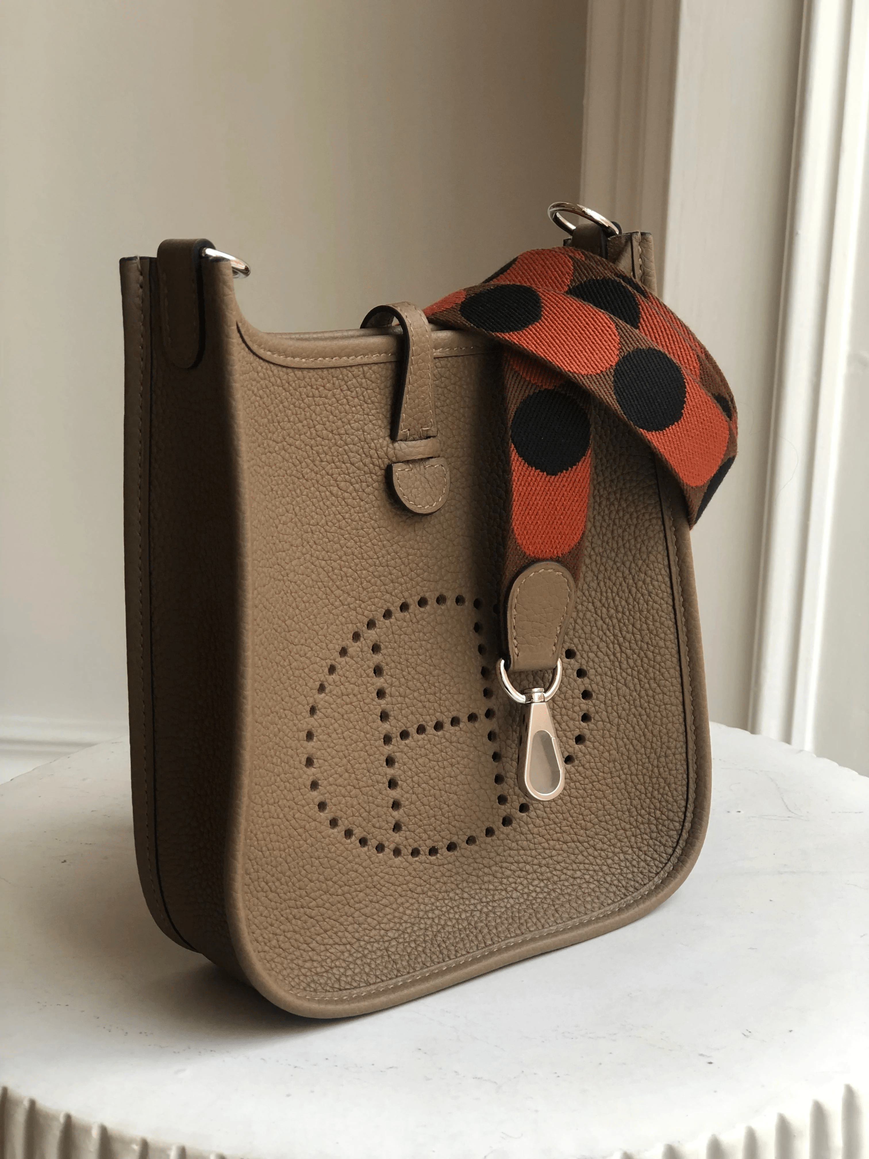 Hermes HERMÈS MINI EVELYN TPM BEIGE DE WEIMAR WITH FLIPPERBALL STRAP Clemence Leather with Palladium Hardware