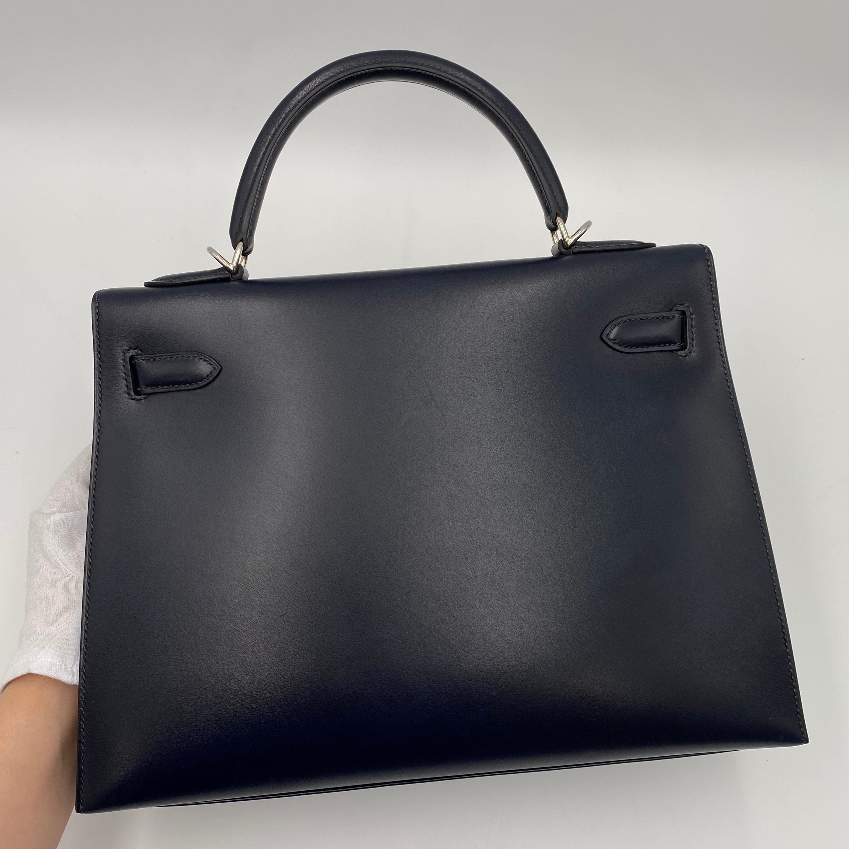 Hermès HERMES KELLY 32 SELLIER GUILLOCHE NAVY BOXCALF □G SHW 90221030