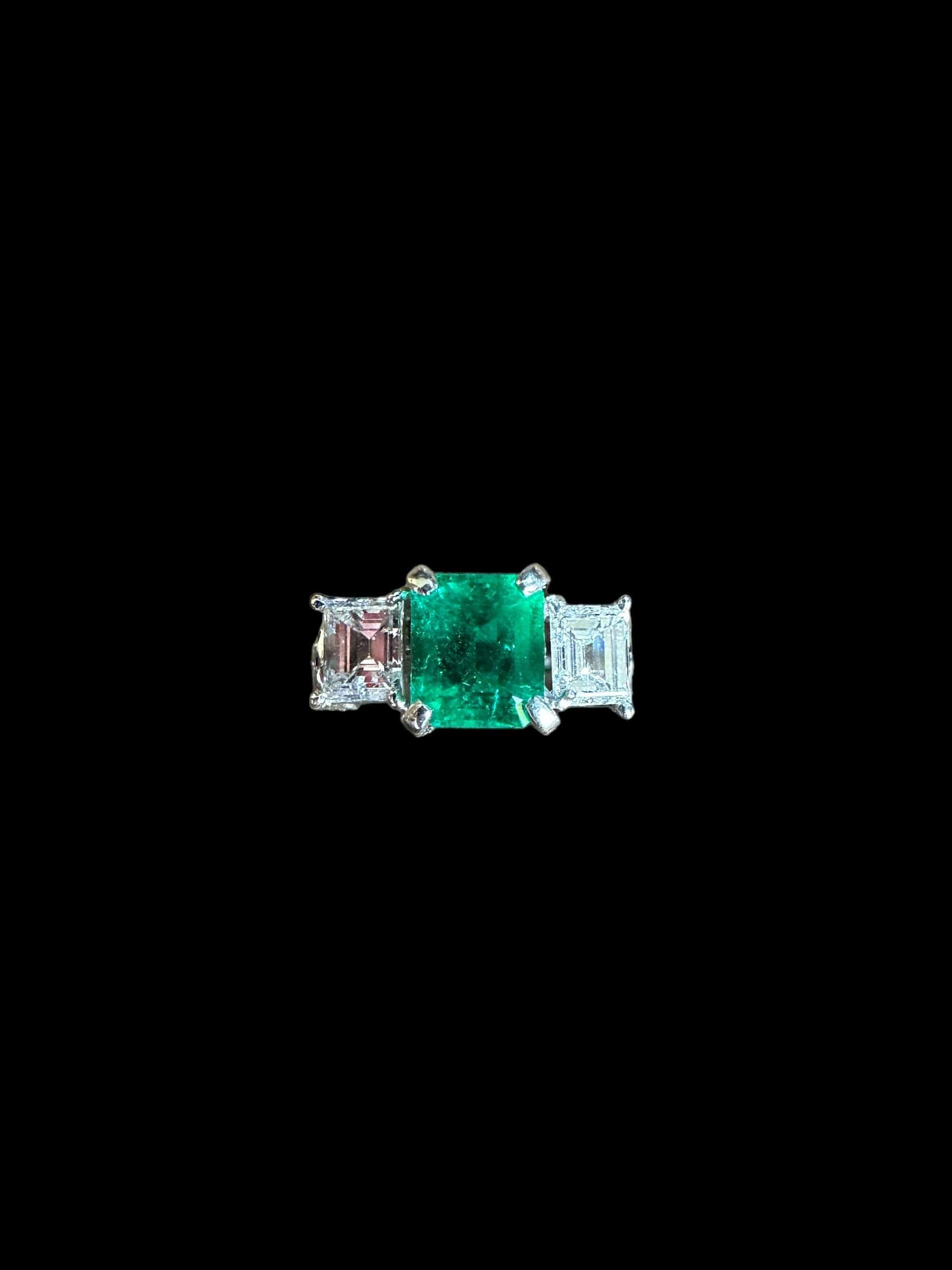 Luxury Promise Emerald Cut Diamond & Emerald Ring set in Platinum