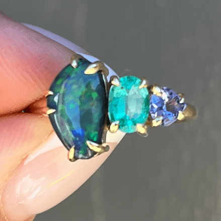 Luxury Promise One off 18ct Yellow Gold Splice Ring with Boulder Opal, Emerald & Tanzanite