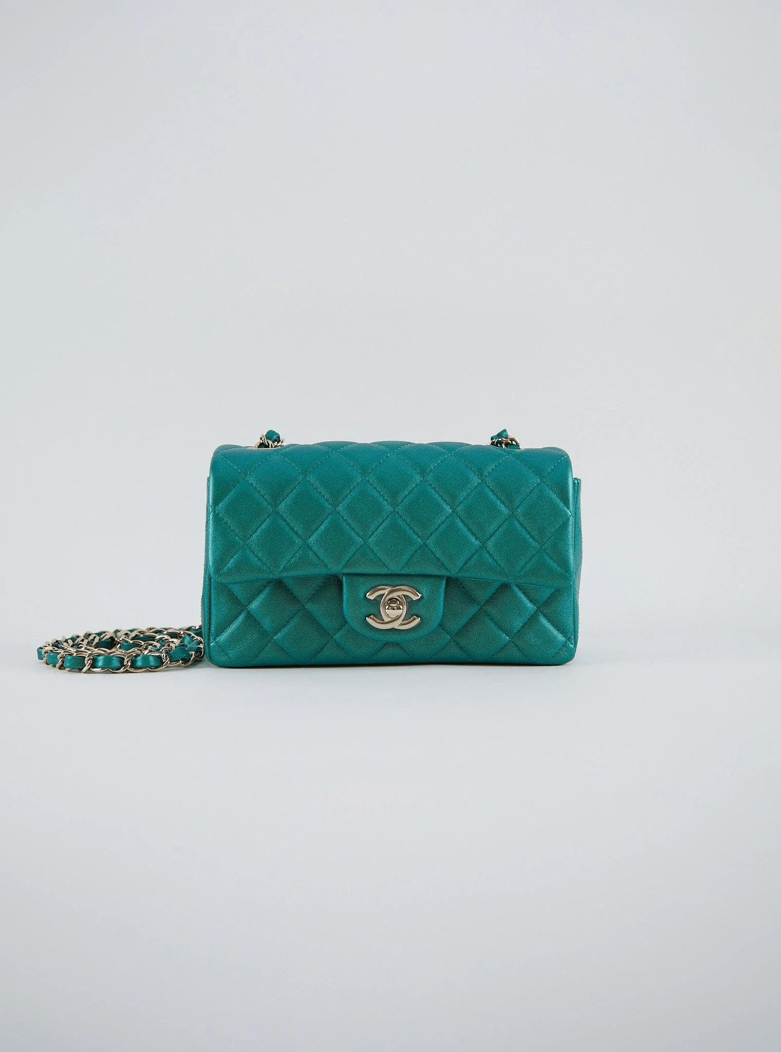 LuxuryVault CHANEL MINI FLAP BAG PEARLESCENT GREEN Lambskin Leather with Champagne Hardware