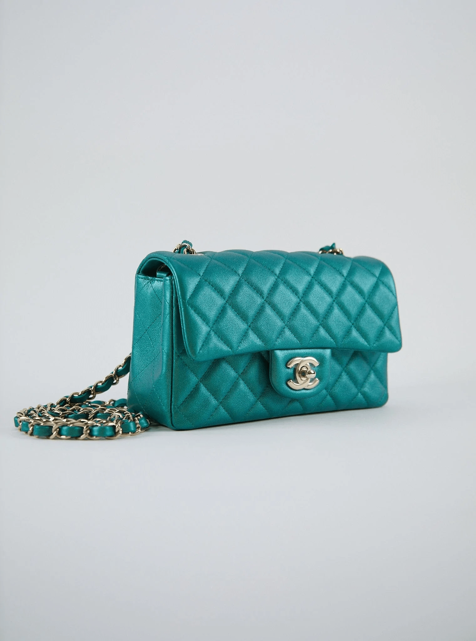 LuxuryVault CHANEL MINI FLAP BAG PEARLESCENT GREEN Lambskin Leather with Champagne Hardware