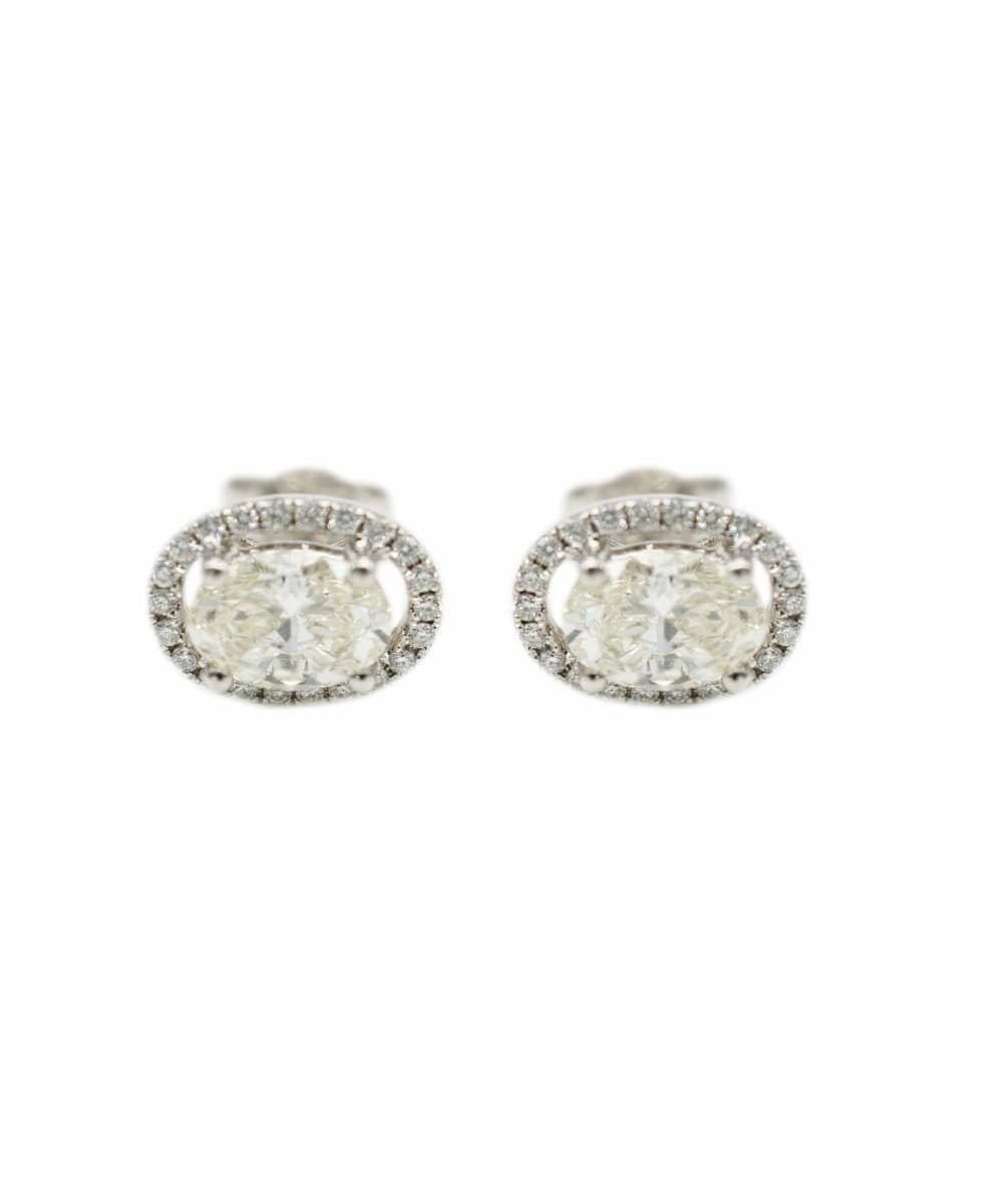 A pair of diamond halo earstuds AVC1092