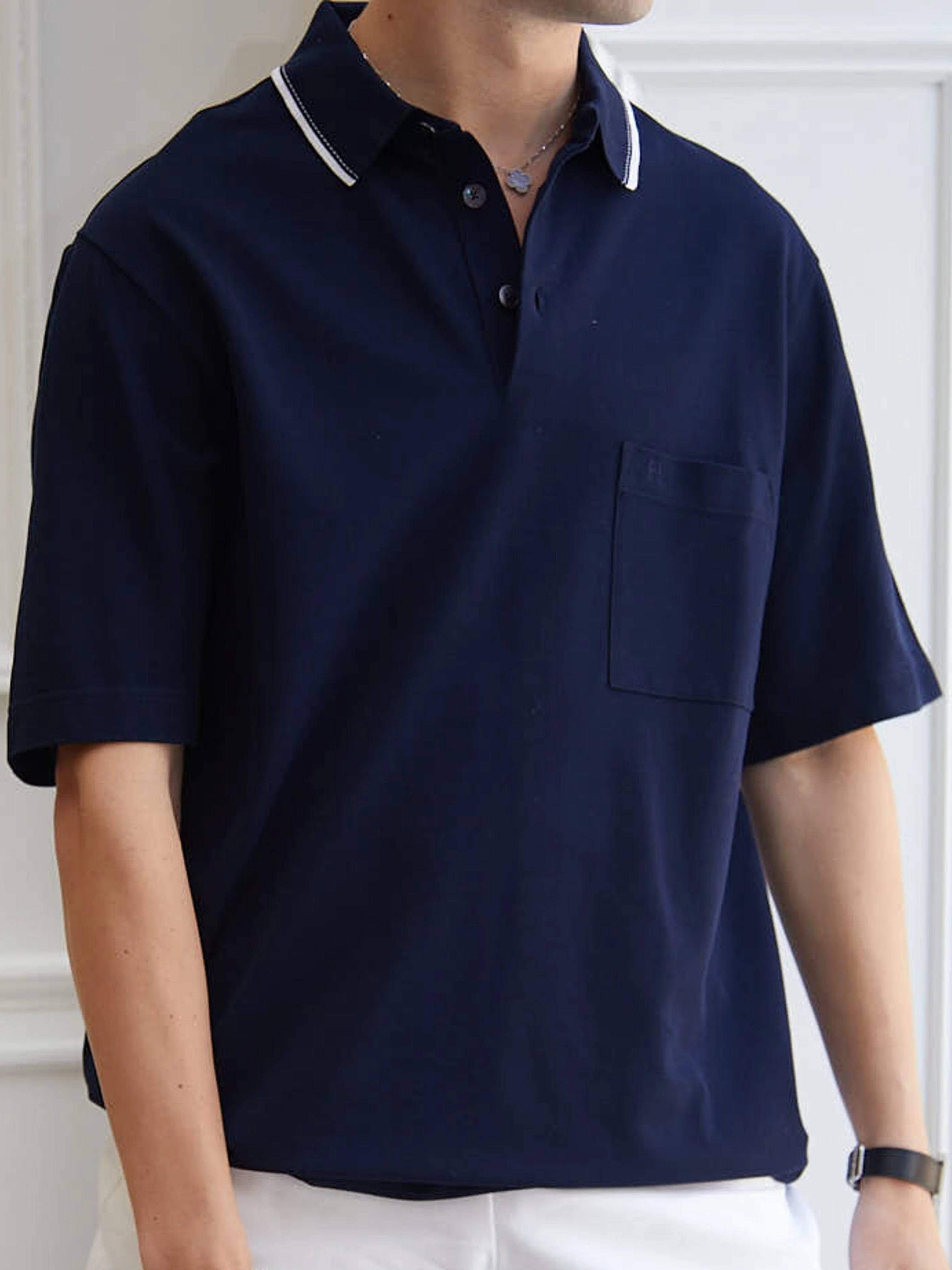 www.LuxuryVault.London HERMÈS "Piqures Sellier" Polo Shirt in White & Marine