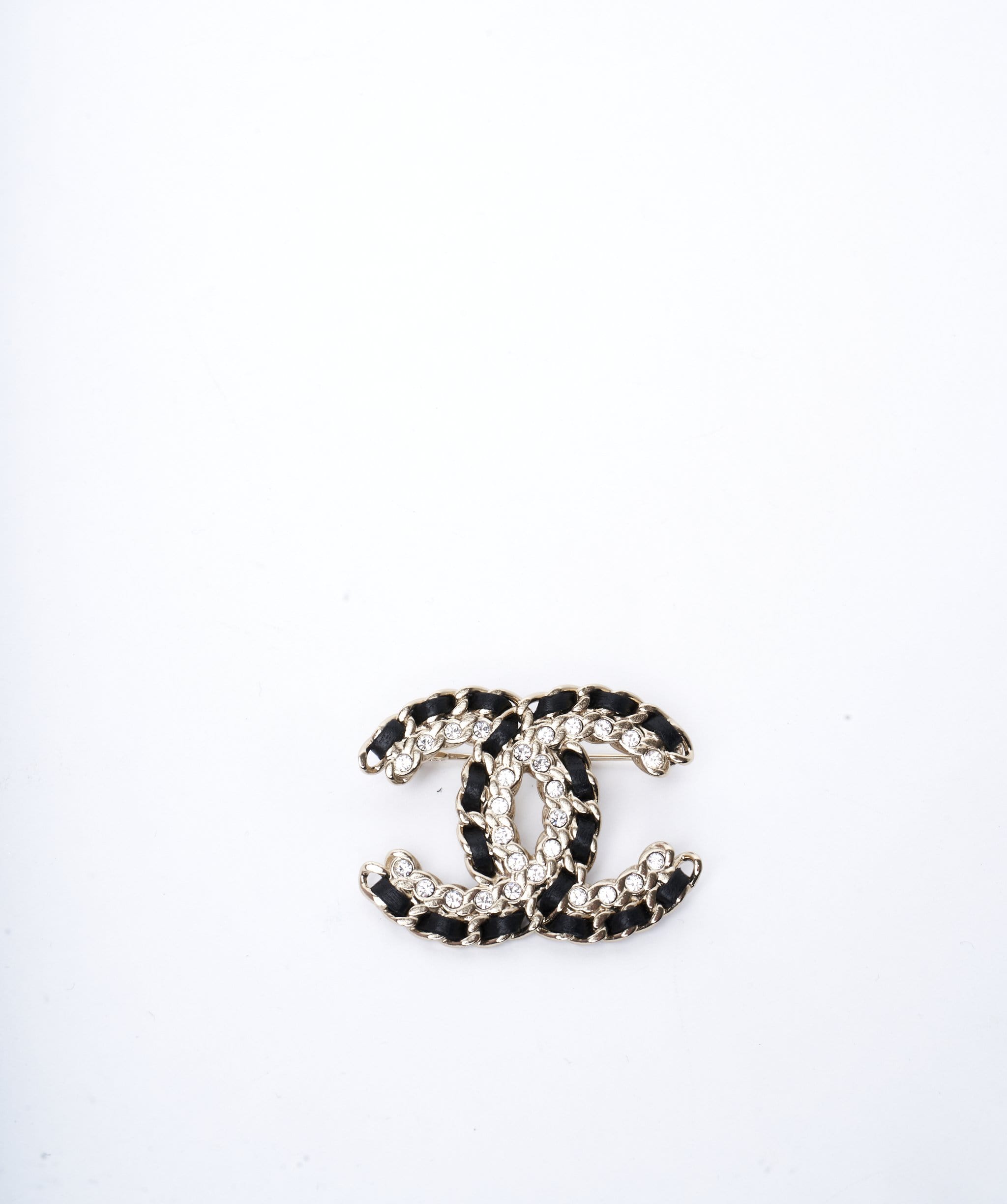 Chanel Chanel black and gold crystal interwoven brooch