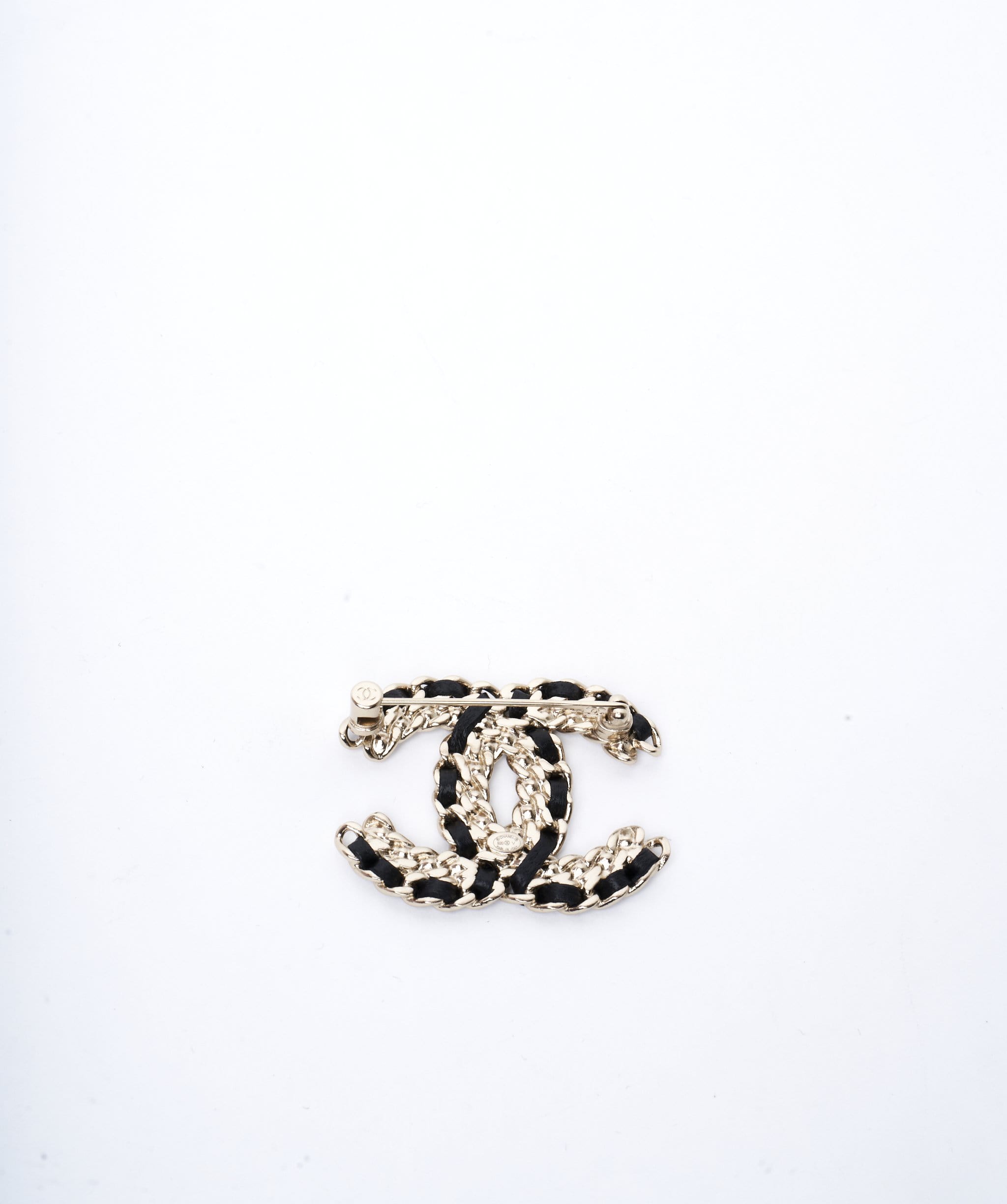 Chanel Chanel black and gold crystal interwoven brooch