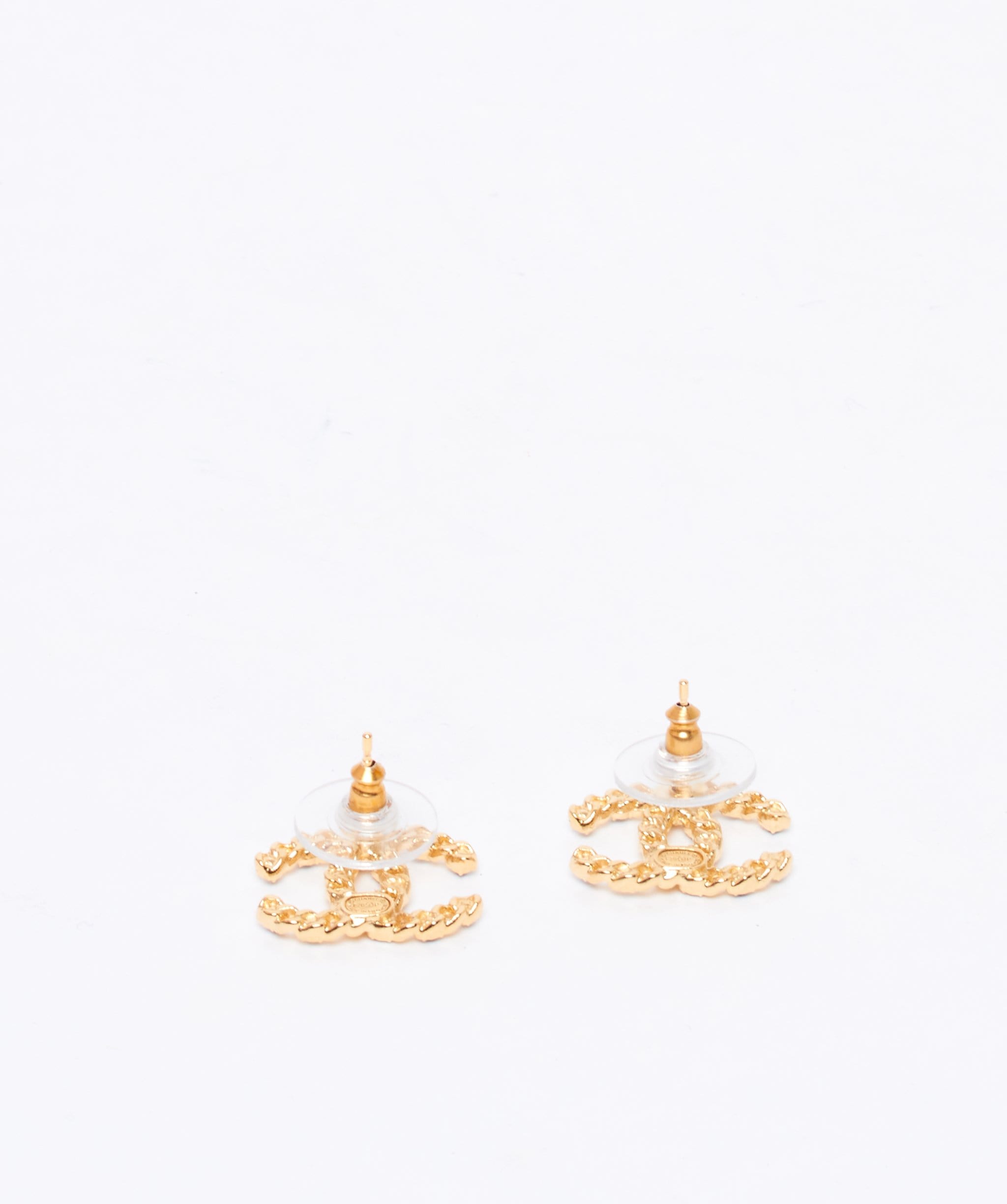 Chanel Chanel black and yellow gold CC stud earrings