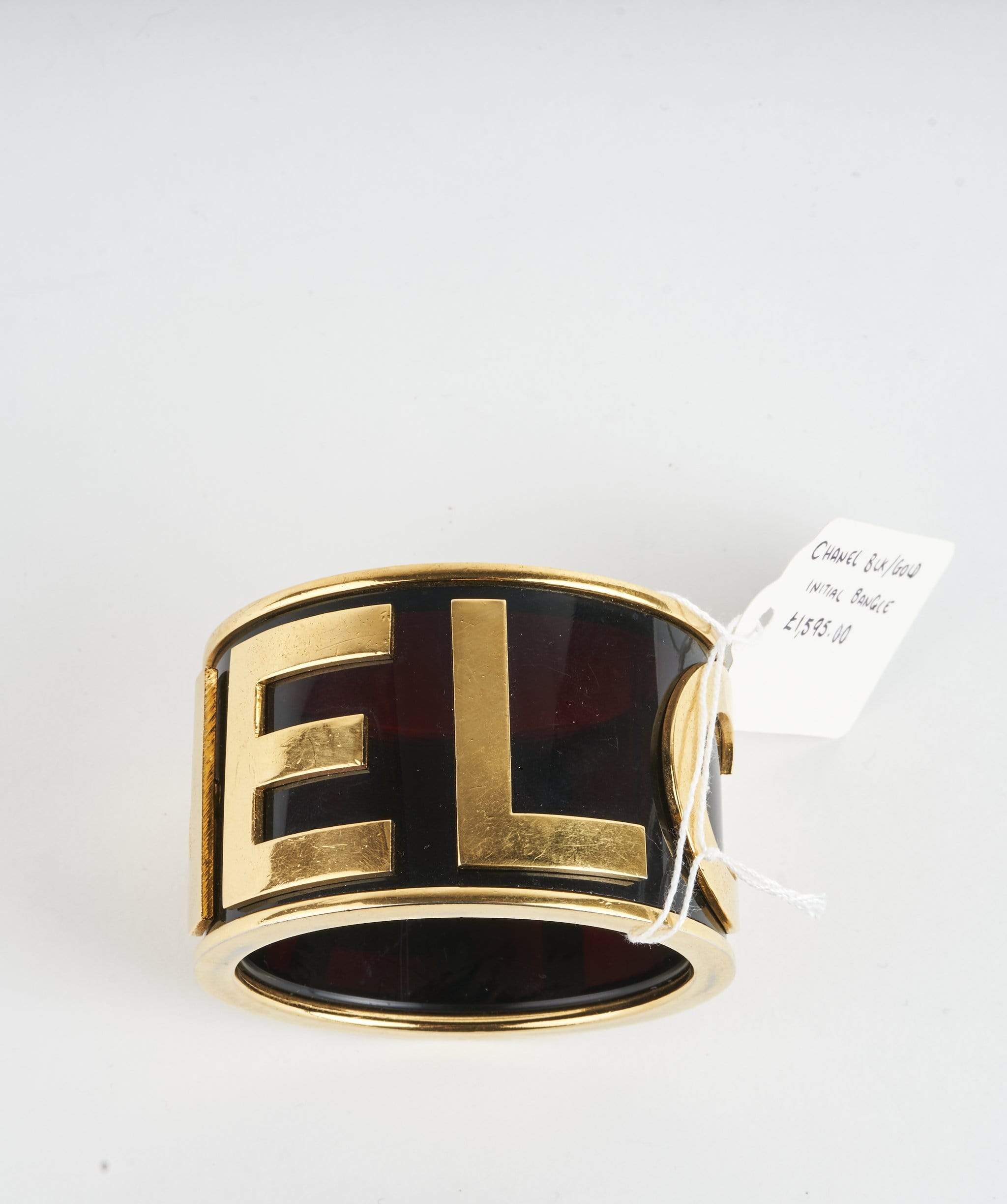 Chanel Chanel Black Gold Initial Bangle