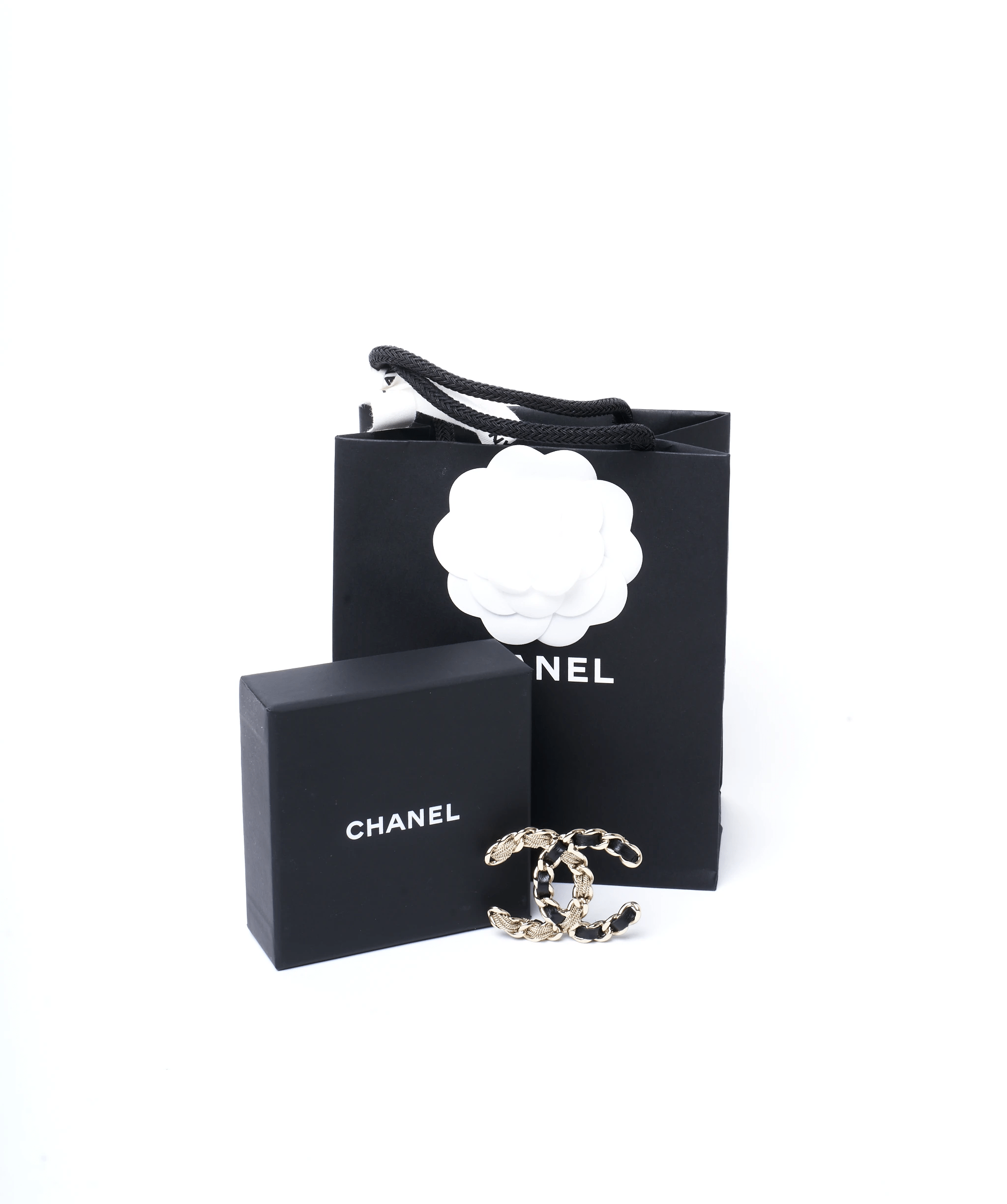 Chanel Chanel CC black and beige rope chain brooch