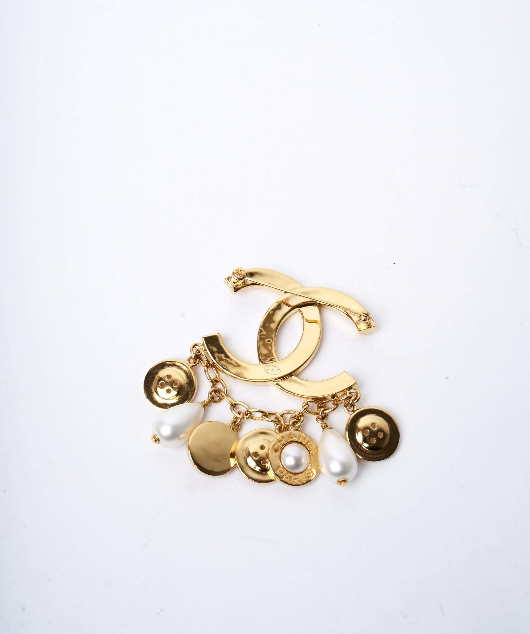 Chanel Chanel CC gold pearl buttoned drop brooch