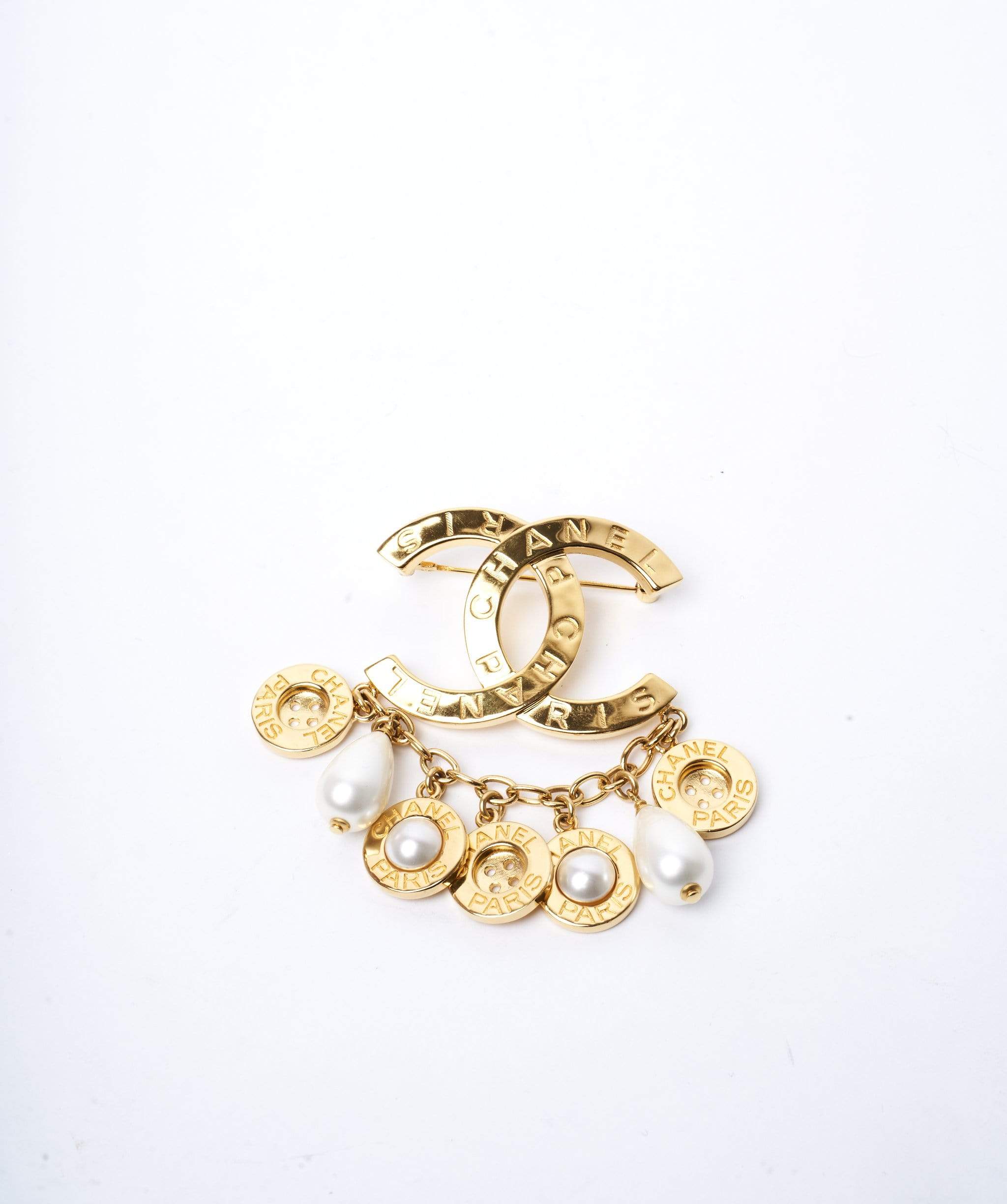 Chanel Chanel CC gold pearl buttoned drop brooch