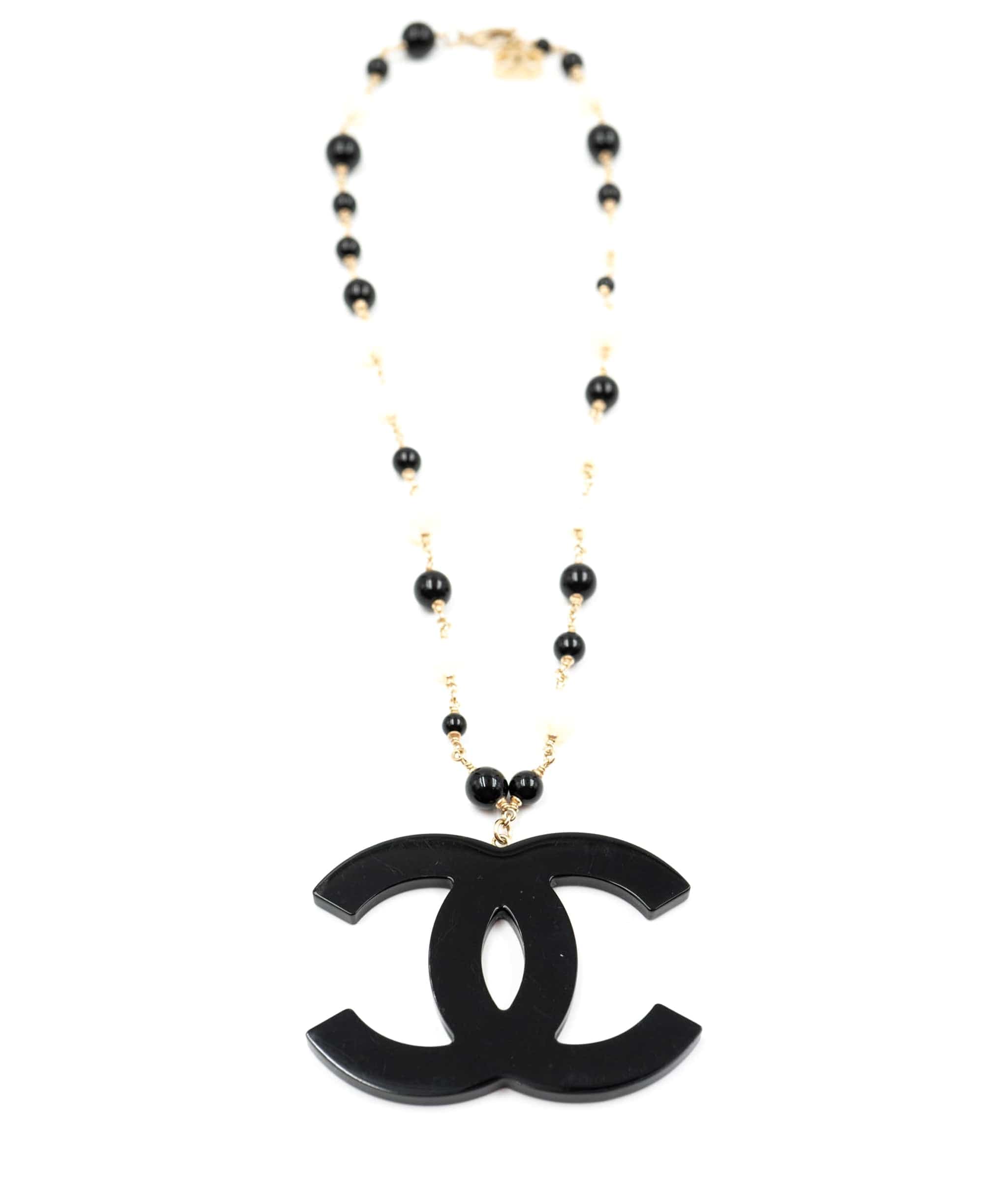 Chanel Chanel CC Logo Camellia Printed Necklace Black/Ivory/Gold Faux Perl/Wood - AWL4094