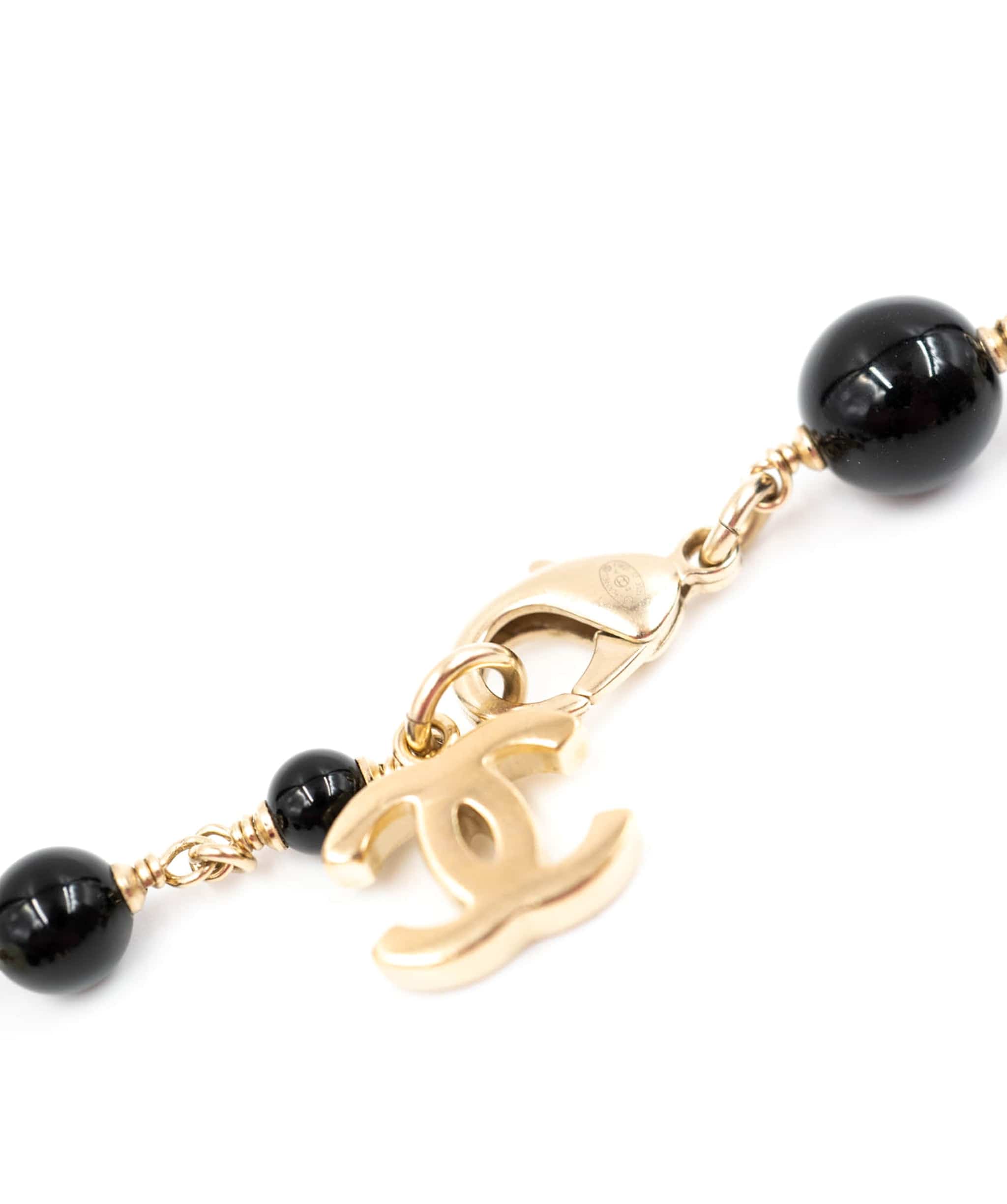 Chanel Chanel CC Logo Camellia Printed Necklace Black/Ivory/Gold Faux Perl/Wood - AWL4094