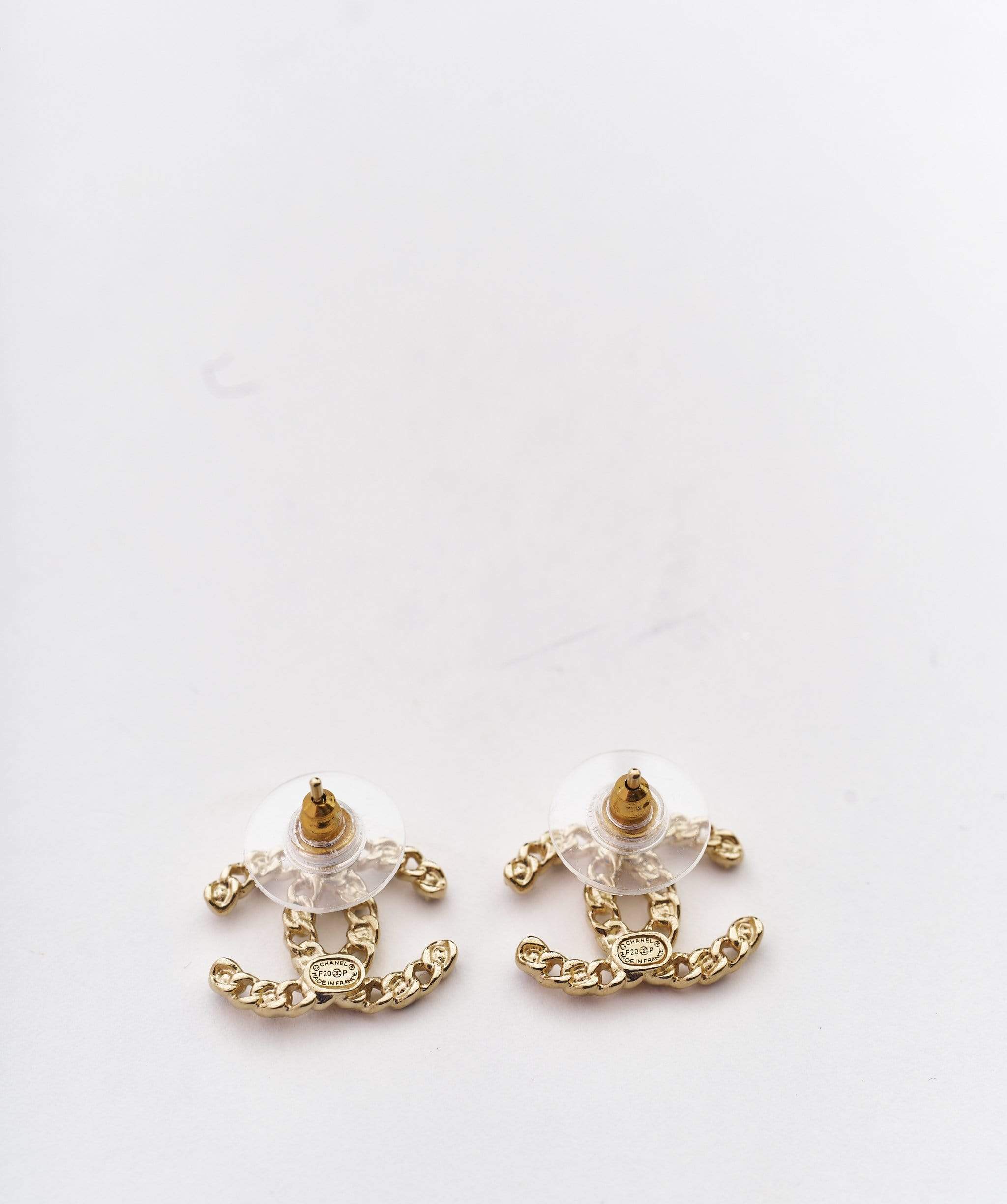 Chanel Chanel CC yellow gold and black crystal earrings