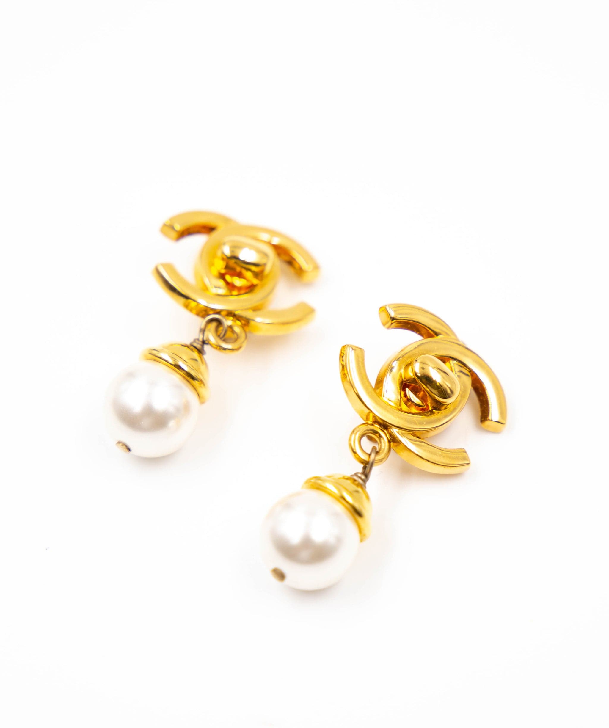 Chanel Chanel Gold CC Pearl Turnlock Clip On Earrings  - AGL1832