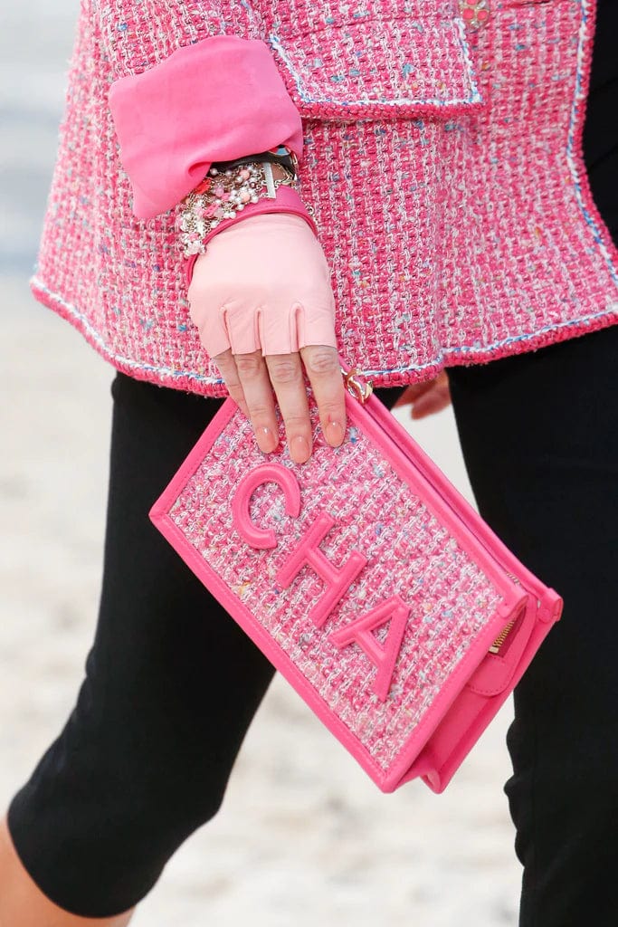 Chanel Chanel pink CHA - NEL wristlet - AWC1425