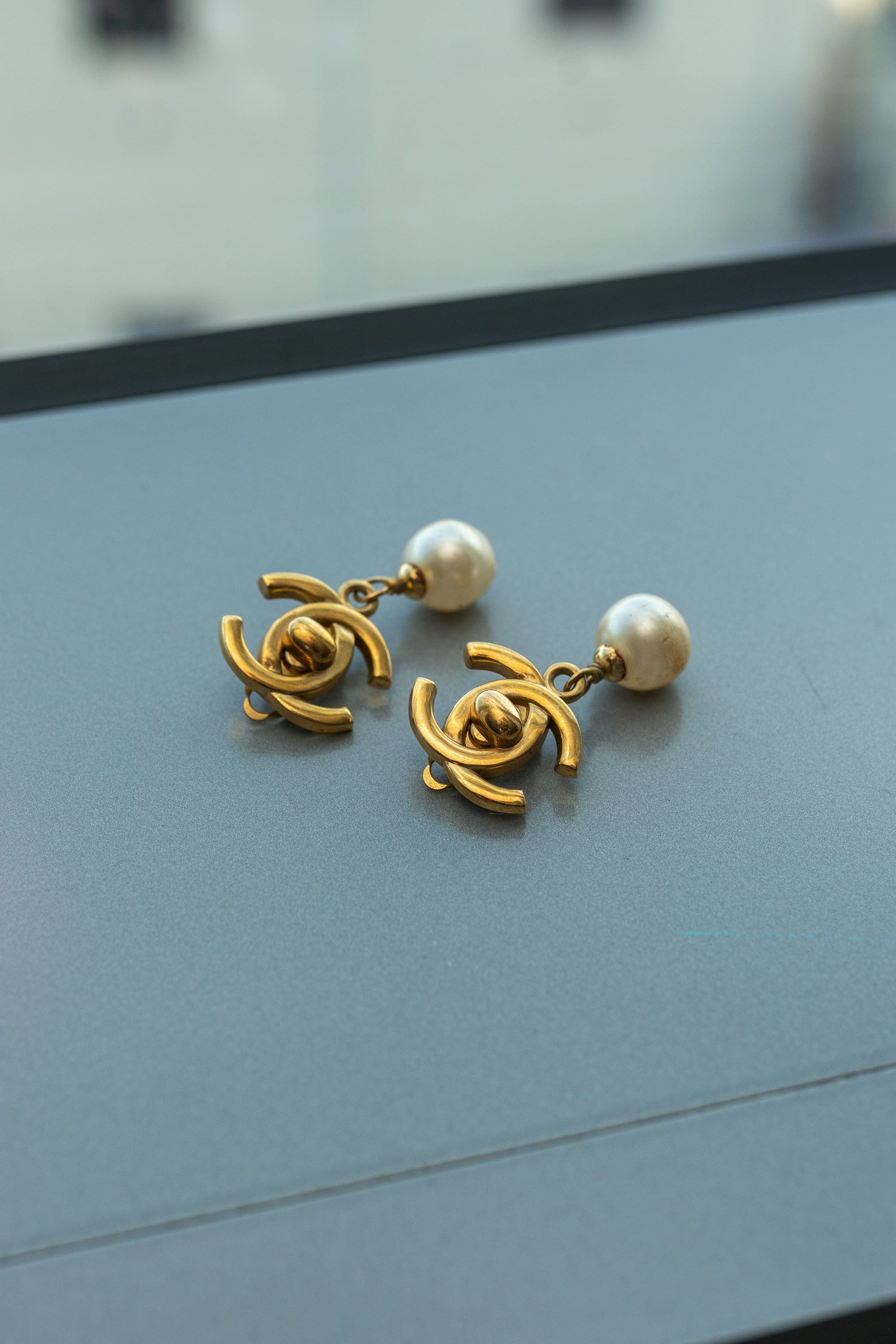 Chanel Chanel Turn Lock Swing Pearl Earrings ASL2965