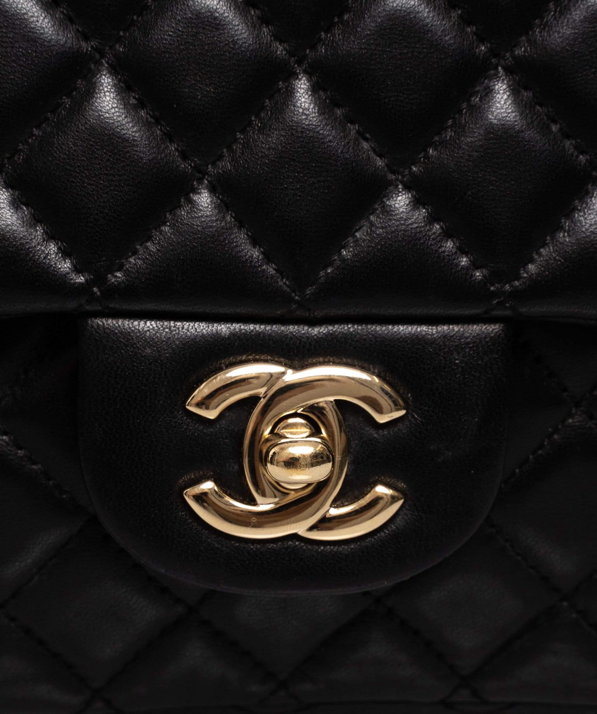 Chanel Chanel Black  Micro Quilted Lambskin 10" Medium Classic Flap GHW