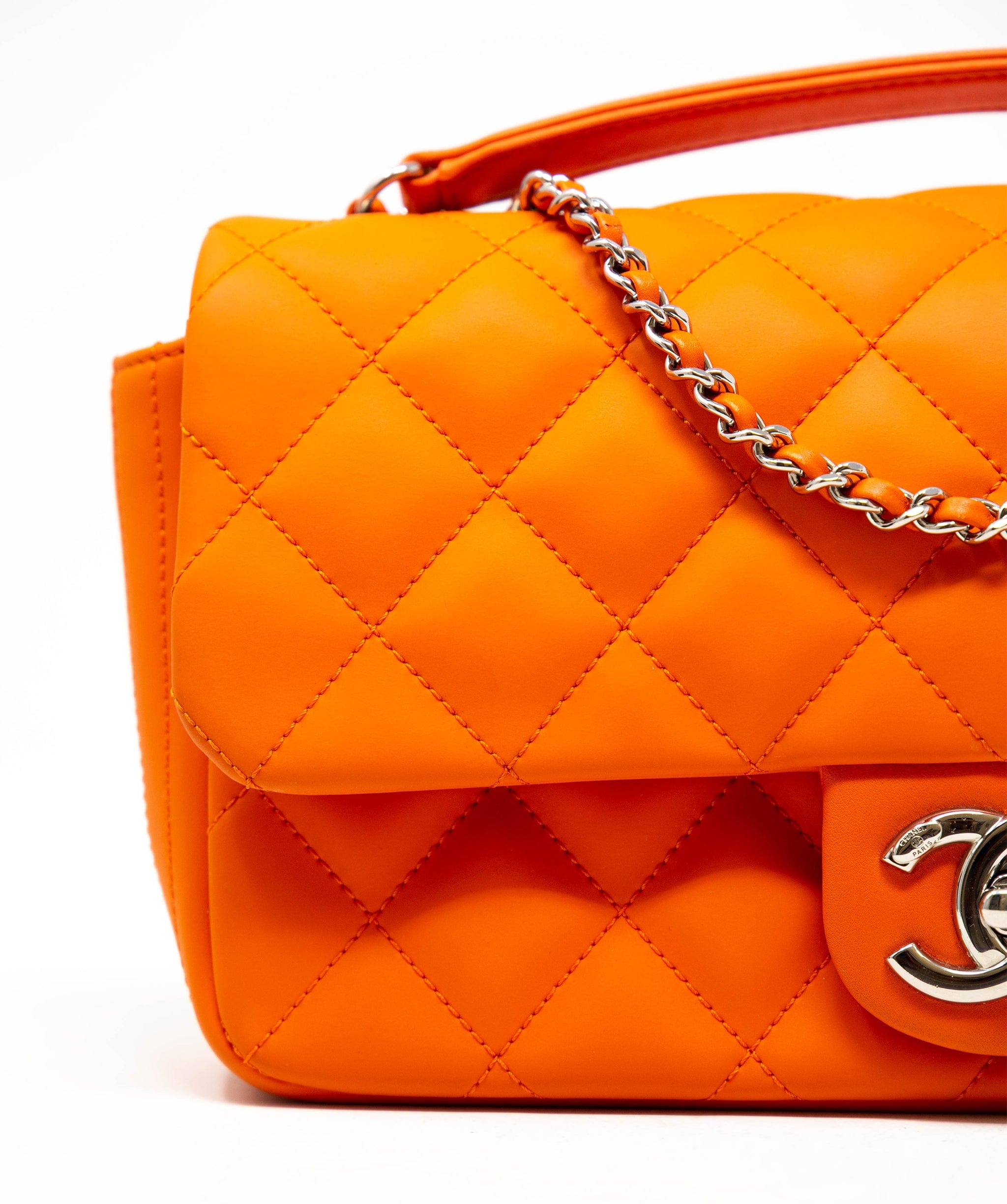 Chanel Rare Chanel bright orange coated leather single flap bag with colourful rain cover,  with silver hardware. - AGL2232