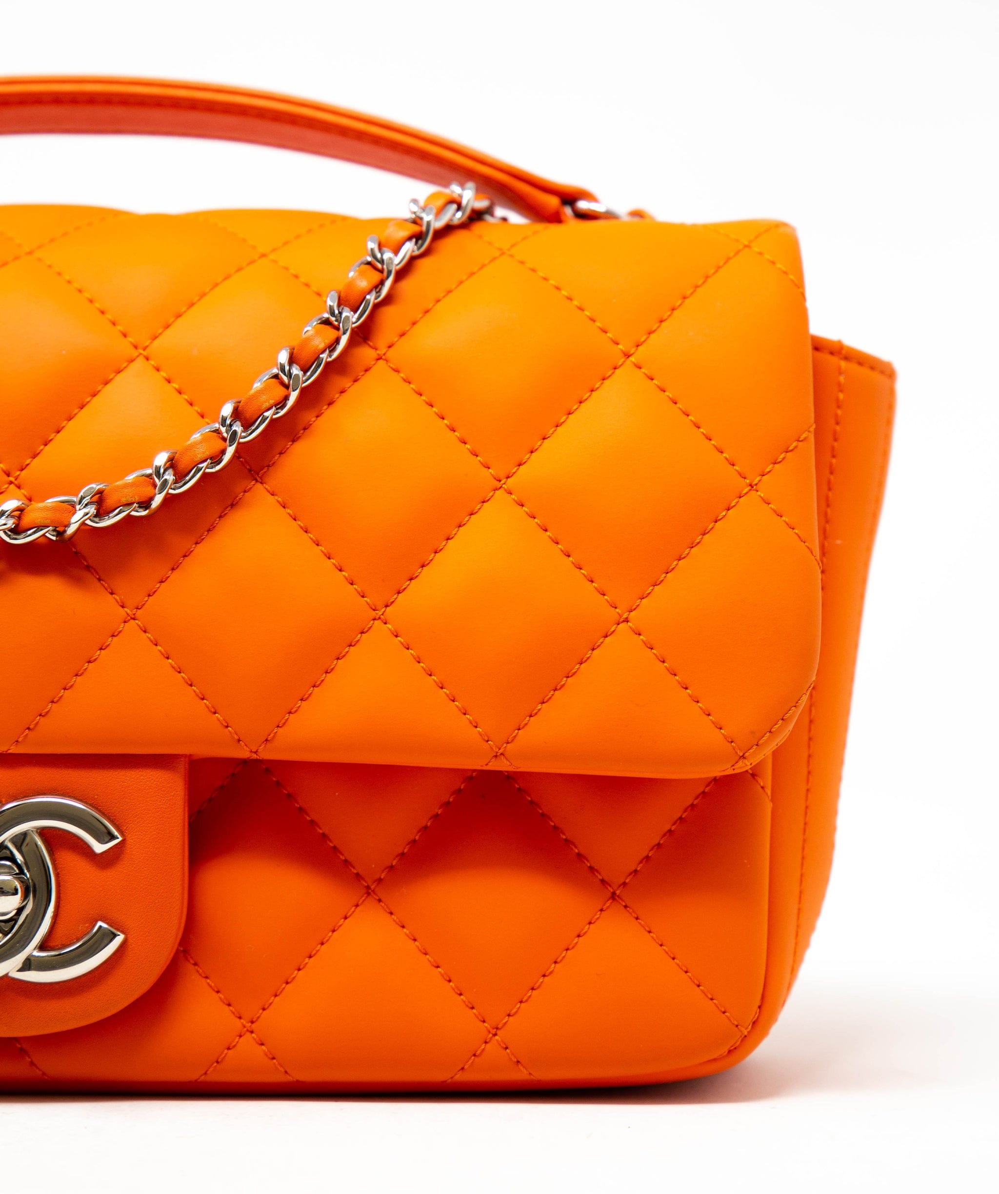 Chanel Rare Chanel bright orange coated leather single flap bag with colourful rain cover,  with silver hardware. - AGL2232