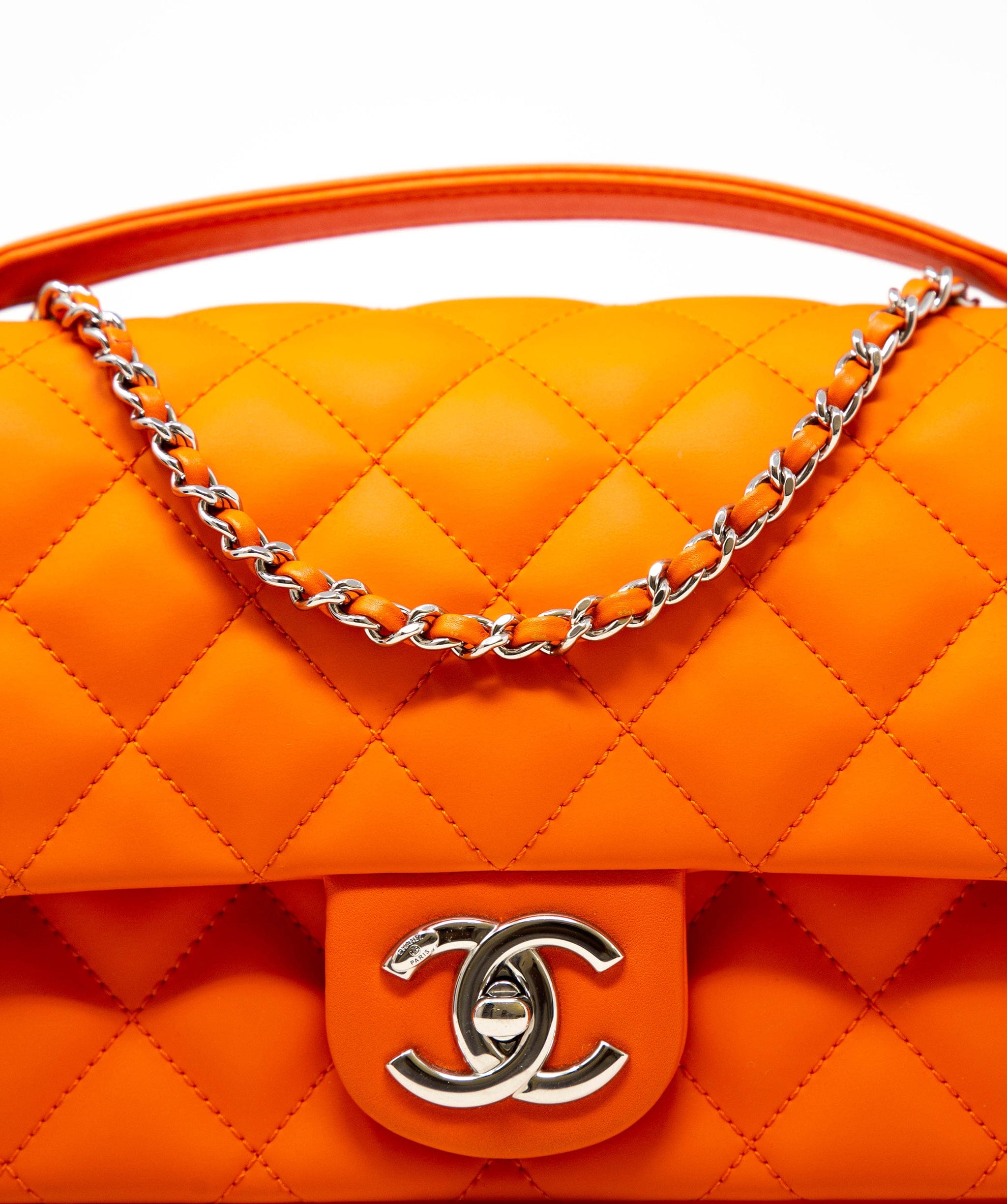 Chanel Rare Chanel bright orange coated leather single flap bag with colourful rain cover,  with silver hardware. - AGL2232