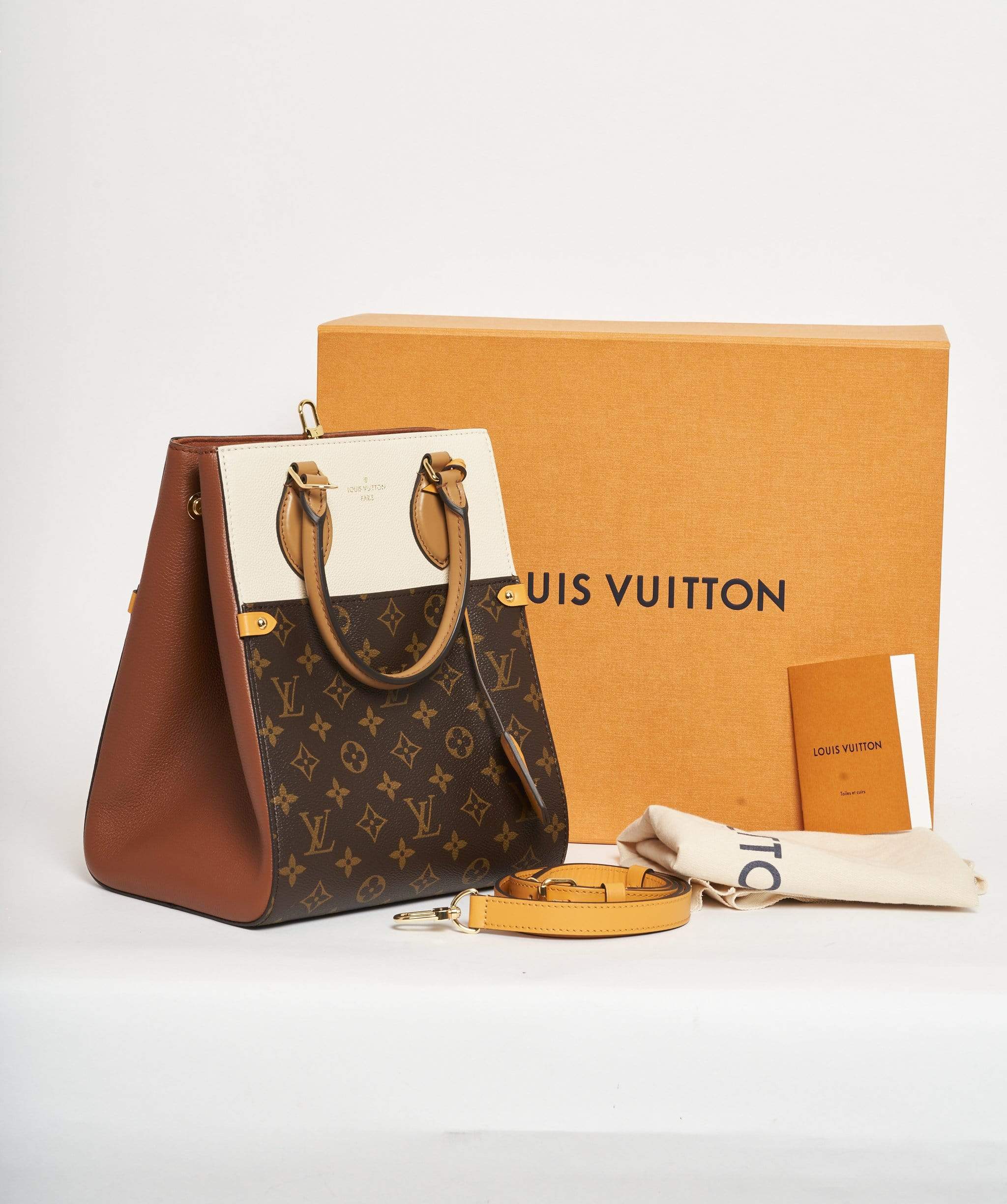 Louis Vuitton Louis Vuitton Rectangular Monogram and tan top handle bag