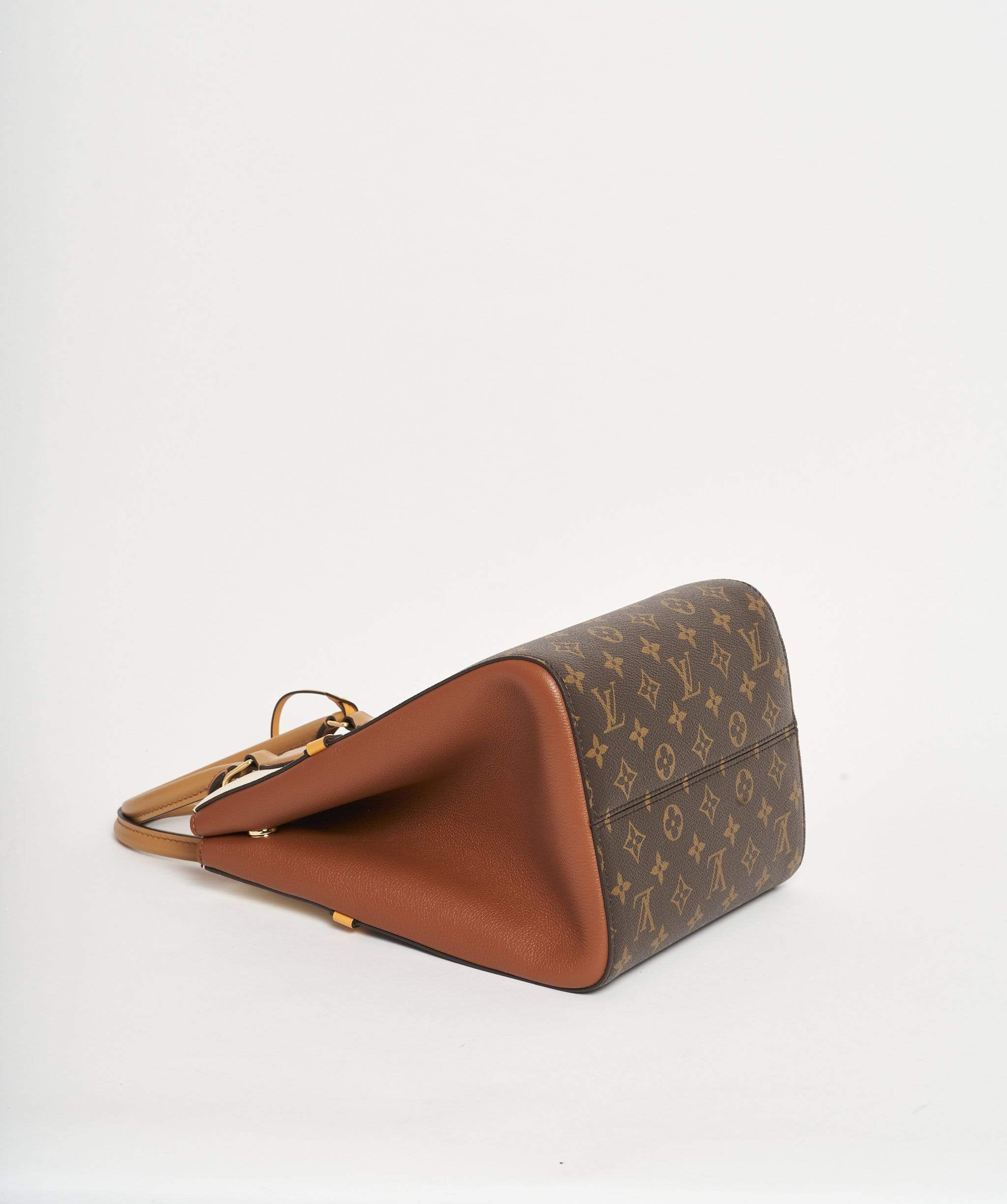 Louis Vuitton Louis Vuitton Rectangular Monogram and tan top handle bag