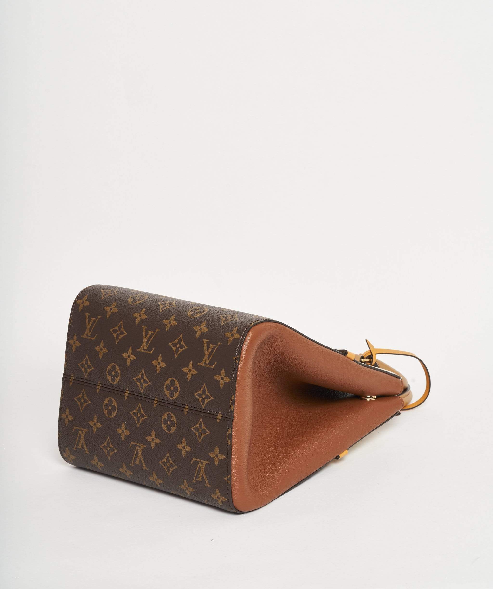 Louis Vuitton Louis Vuitton Rectangular Monogram and tan top handle bag