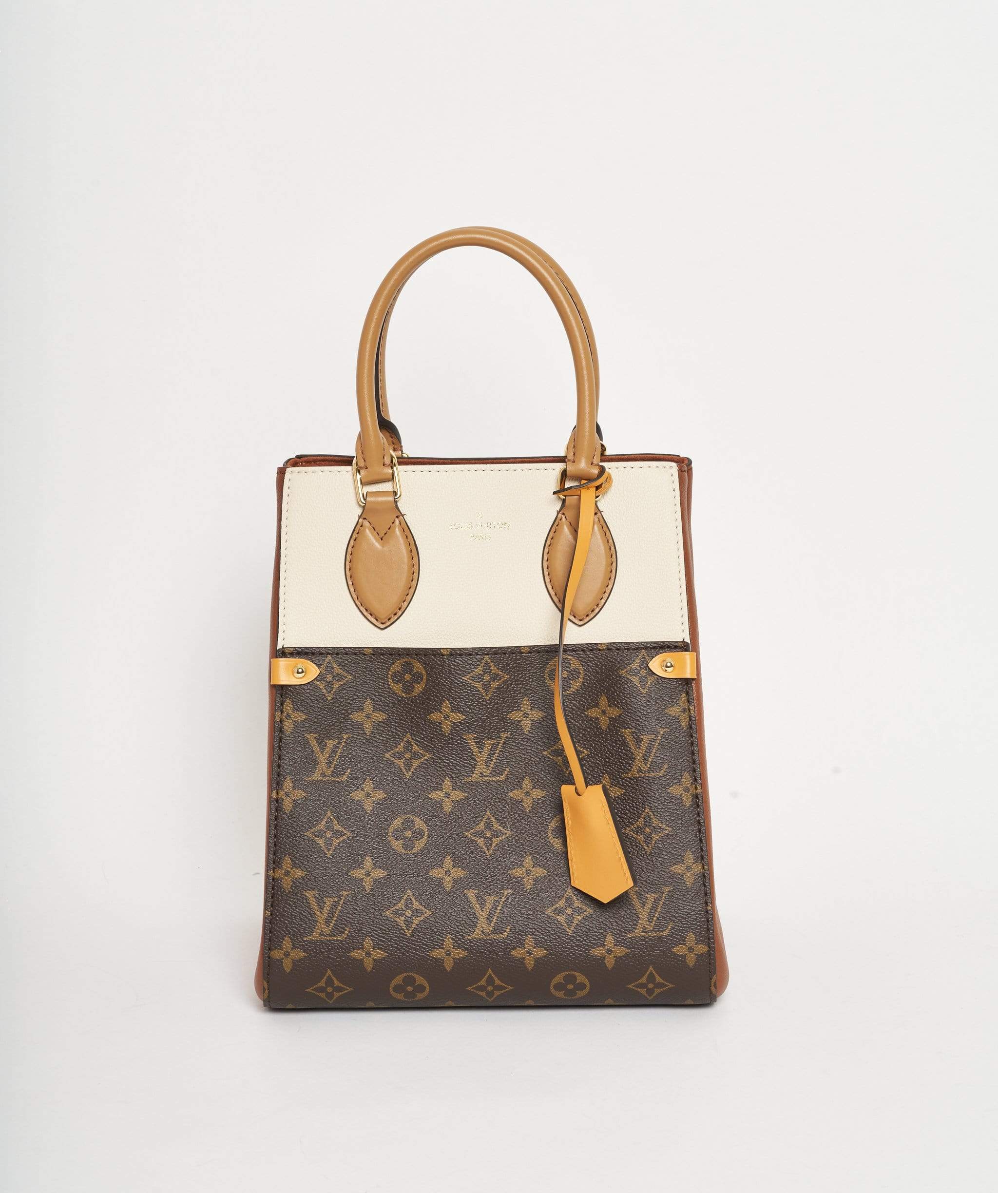 Louis Vuitton Louis Vuitton Rectangular Monogram and tan top handle bag