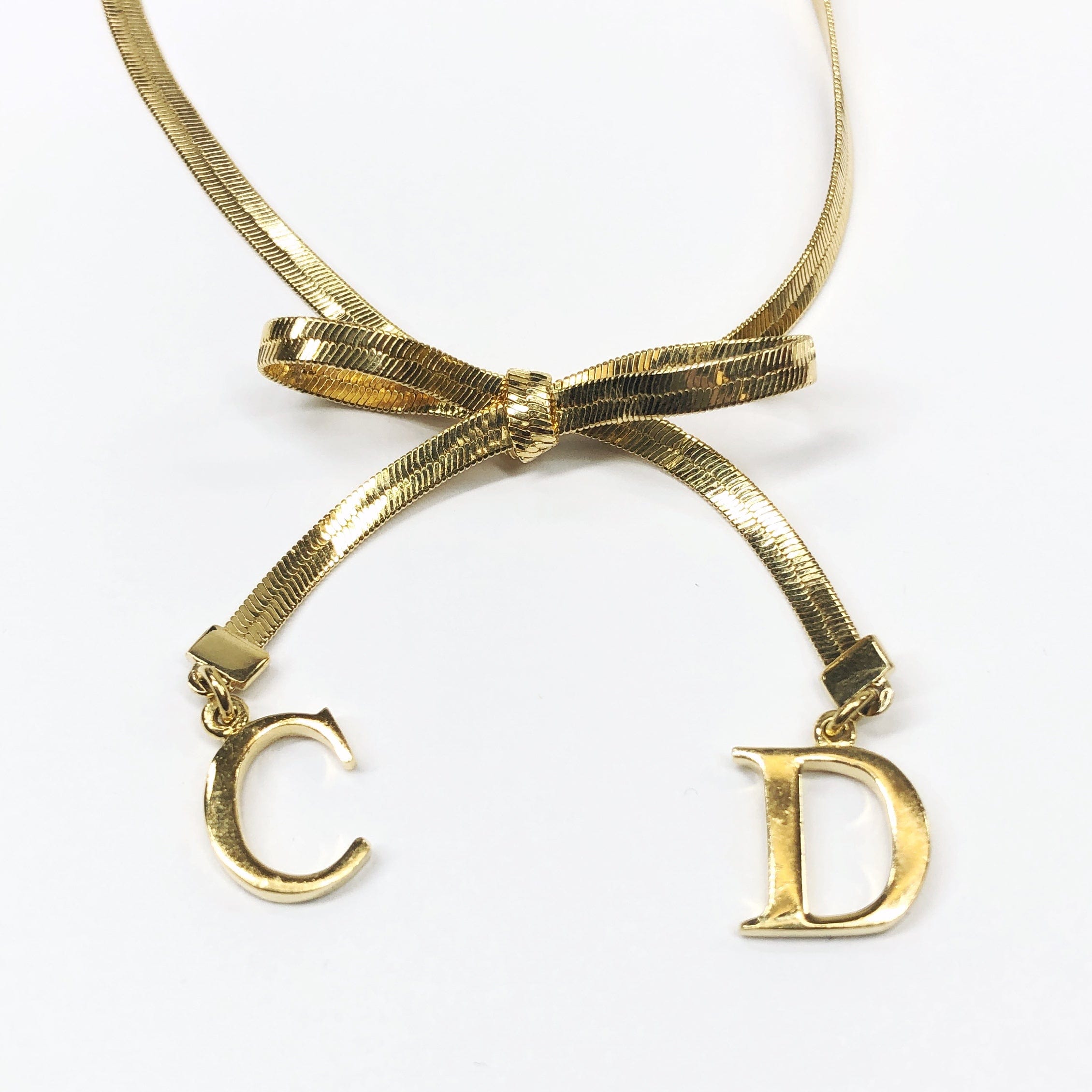 LuxuryPromise Dior Ribbon X Logo Necklace